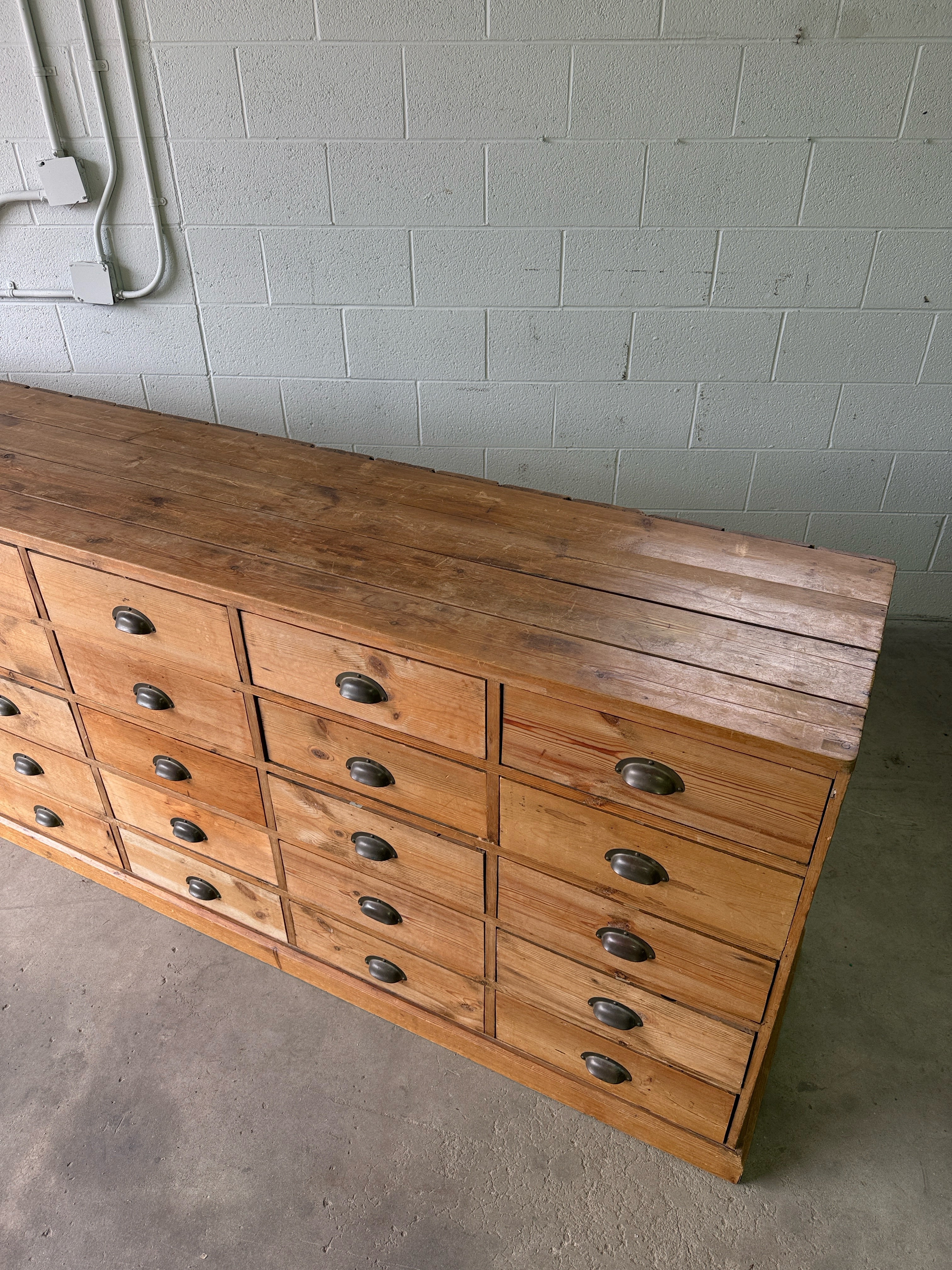 Antique European bank of haberdashery drawers