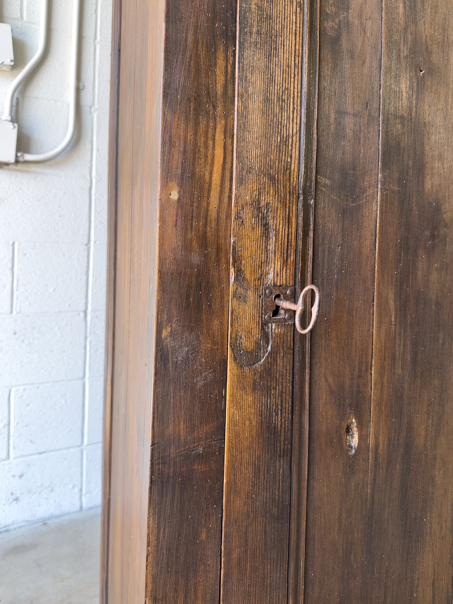 Dark stained antique pine cupboard