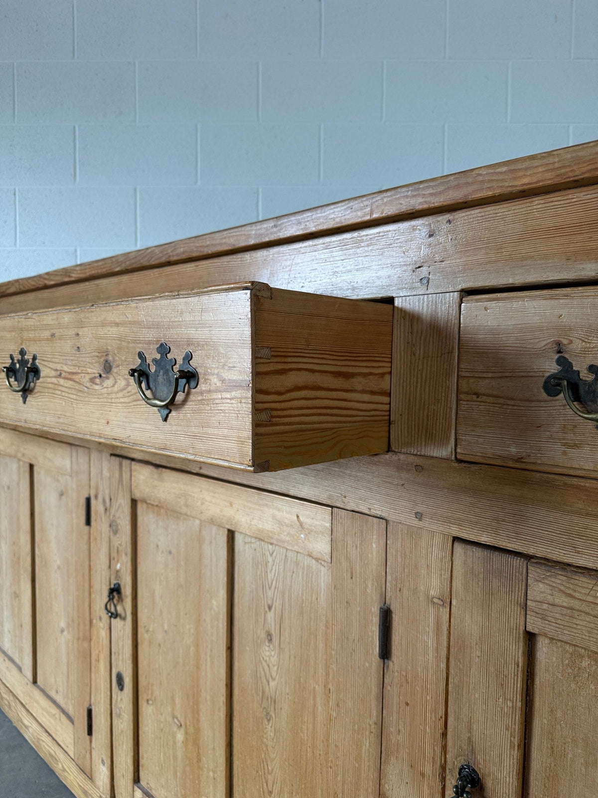 19th‑century English pine sideboard with three drawers and cupboards below - House on Horizon