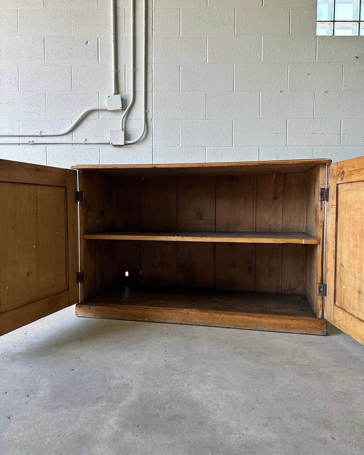 Small antique pine two-door cupboard or sideboard