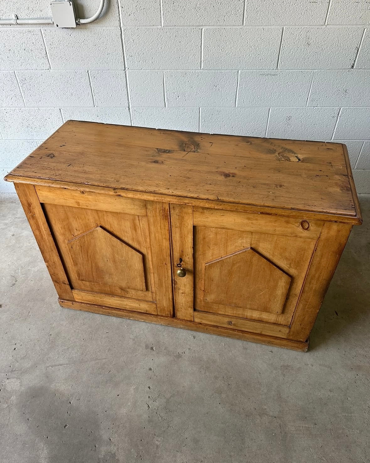 Small antique pine two-door cupboard or sideboard