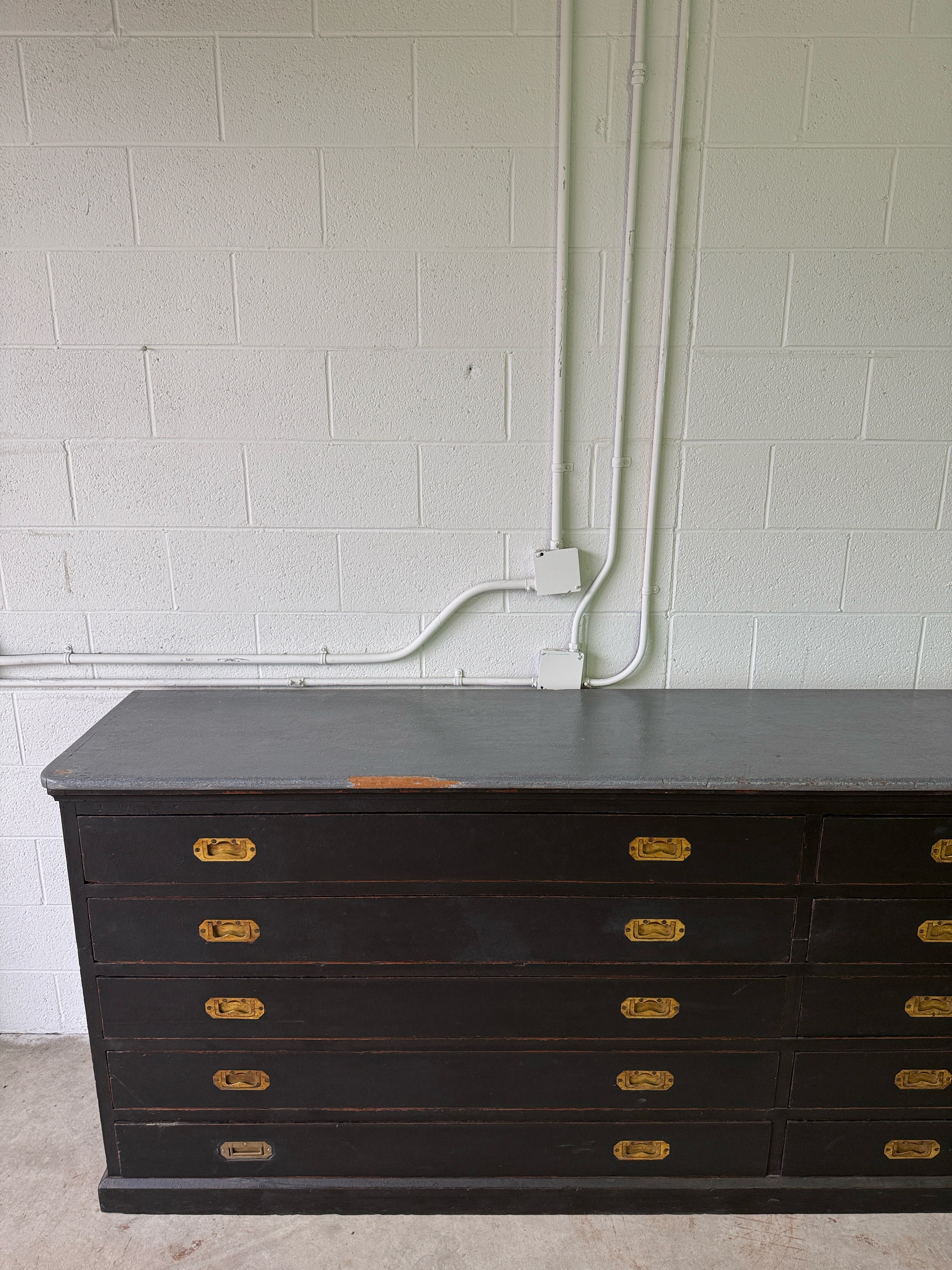 Monumental antique bank of 10 drawers with brass campaign handles