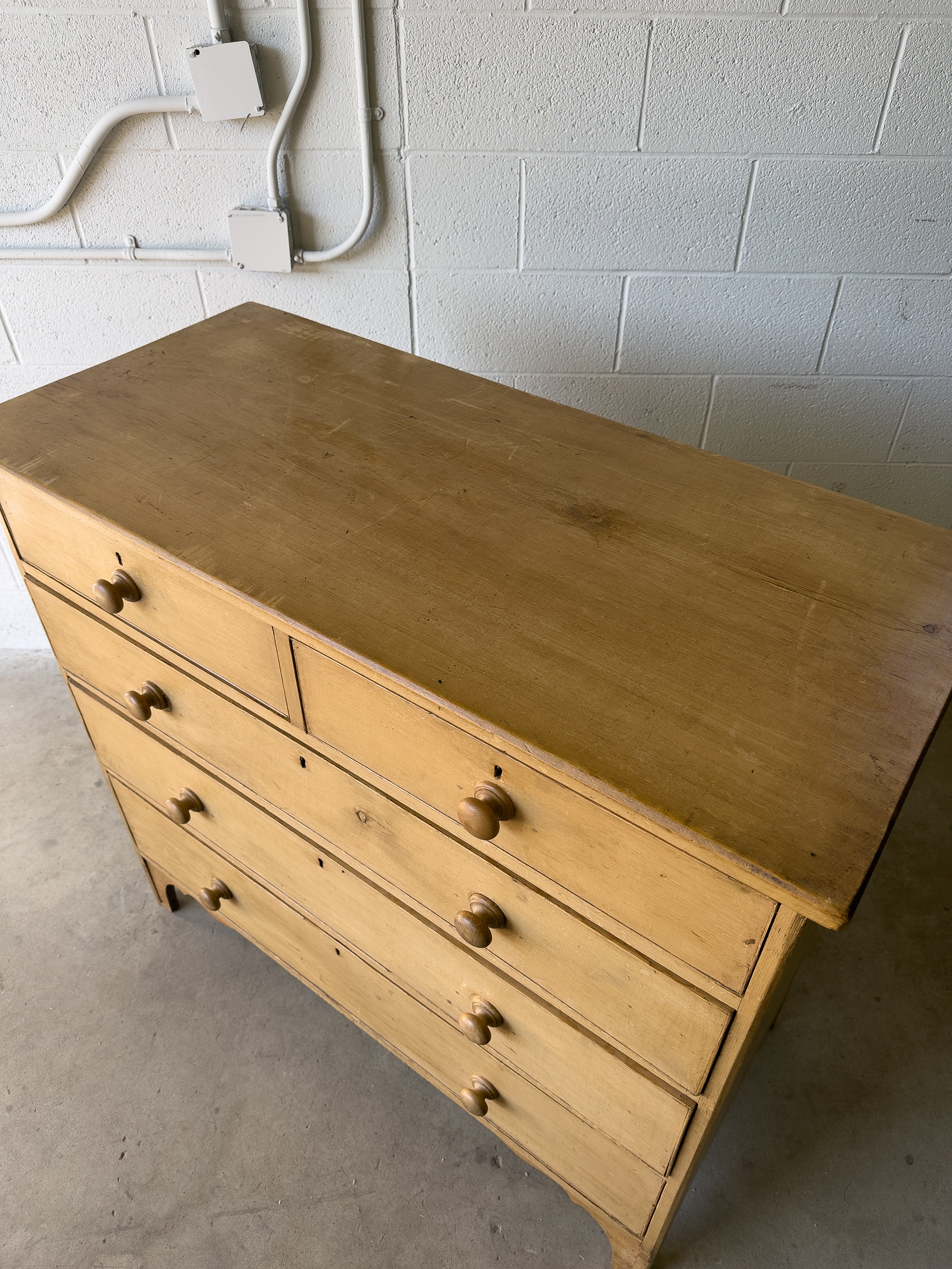 Antique English pine dresser on bracket feet