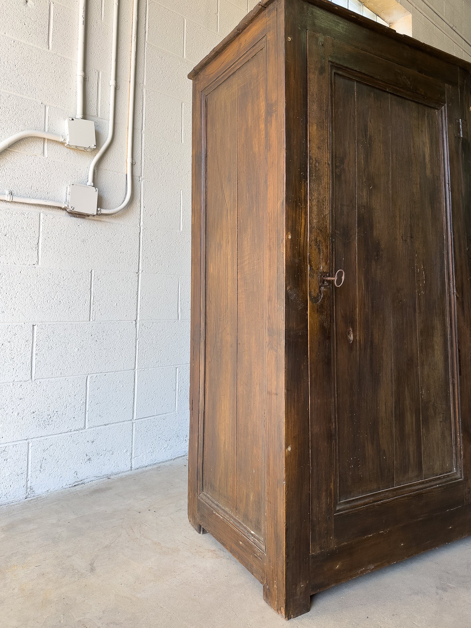 Dark stained antique pine cupboard