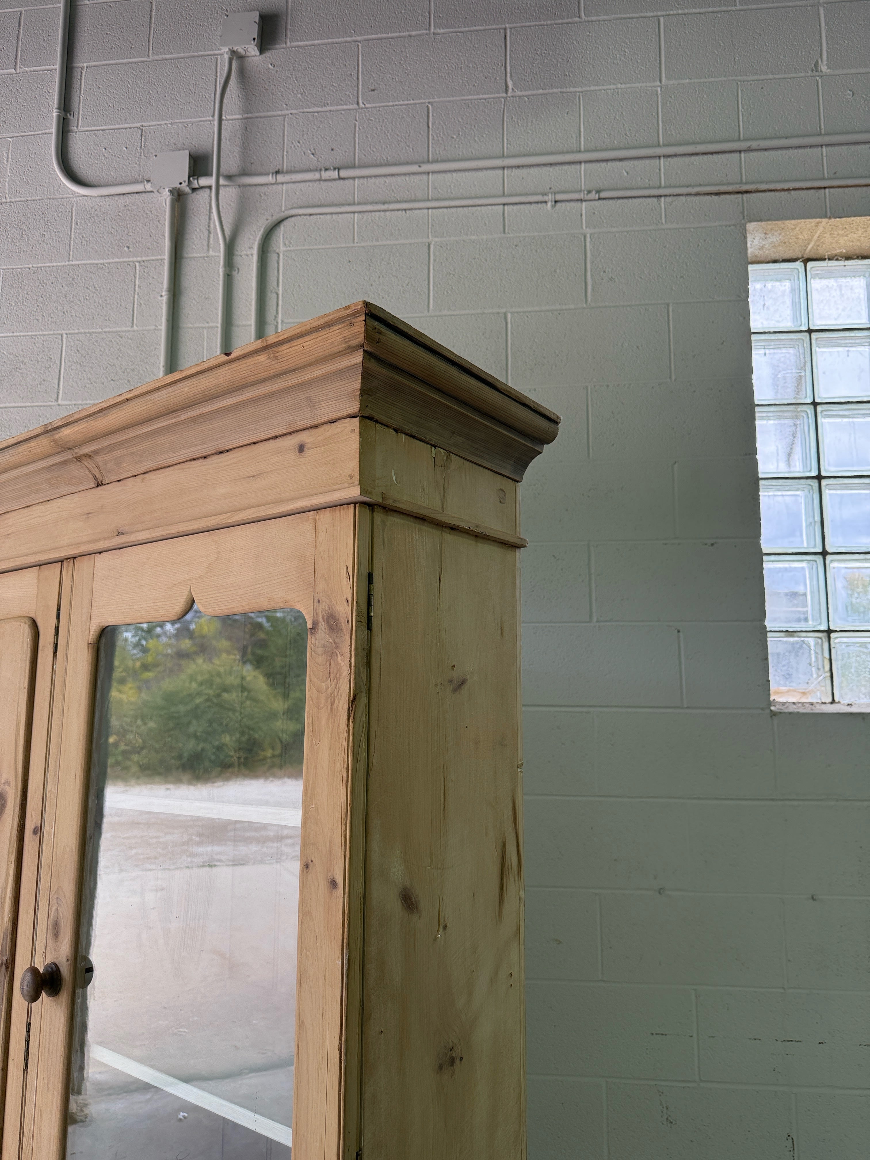 Antique pine housekeepers cupboard with wavy glass