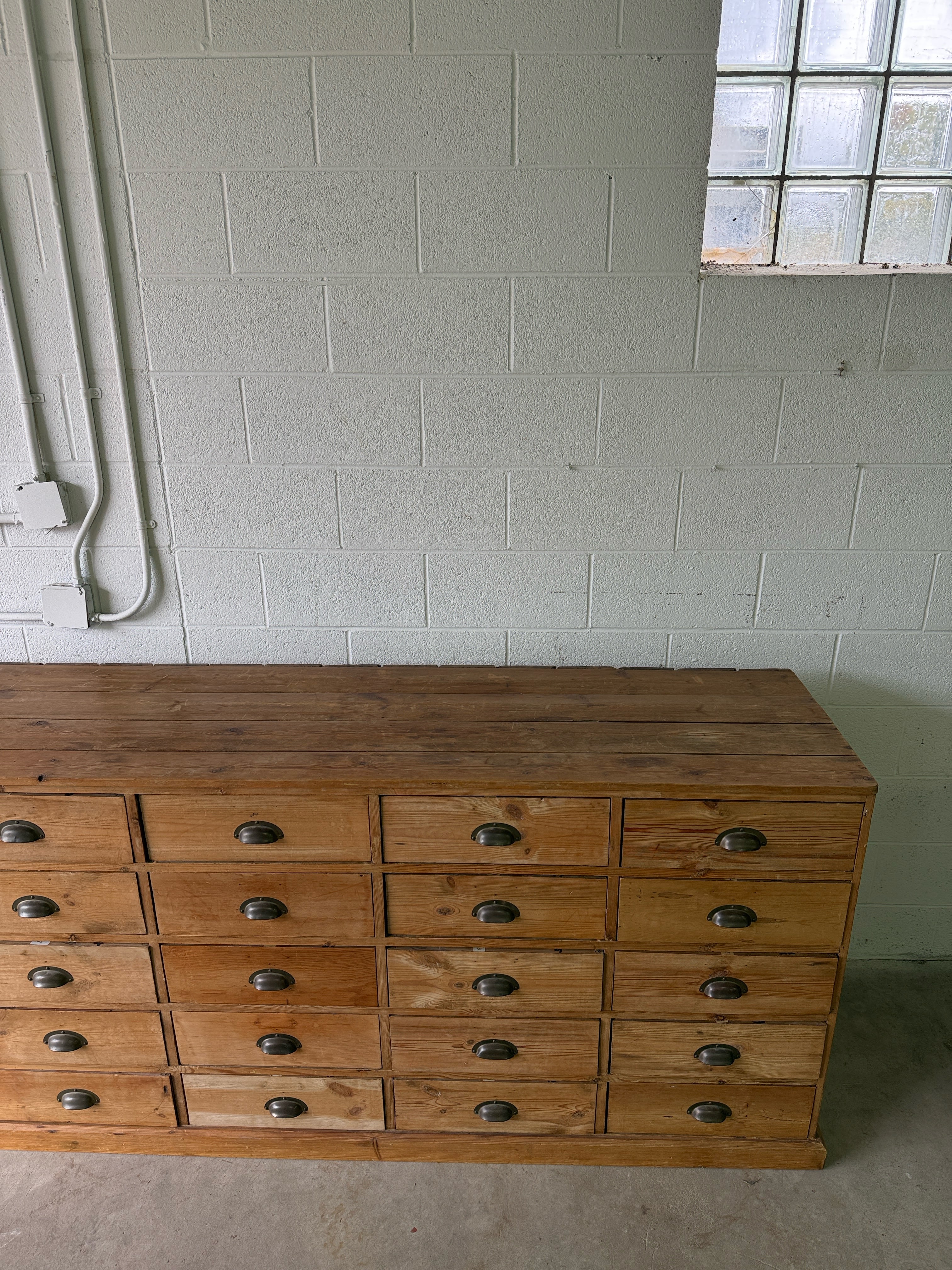 Antique European bank of haberdashery drawers