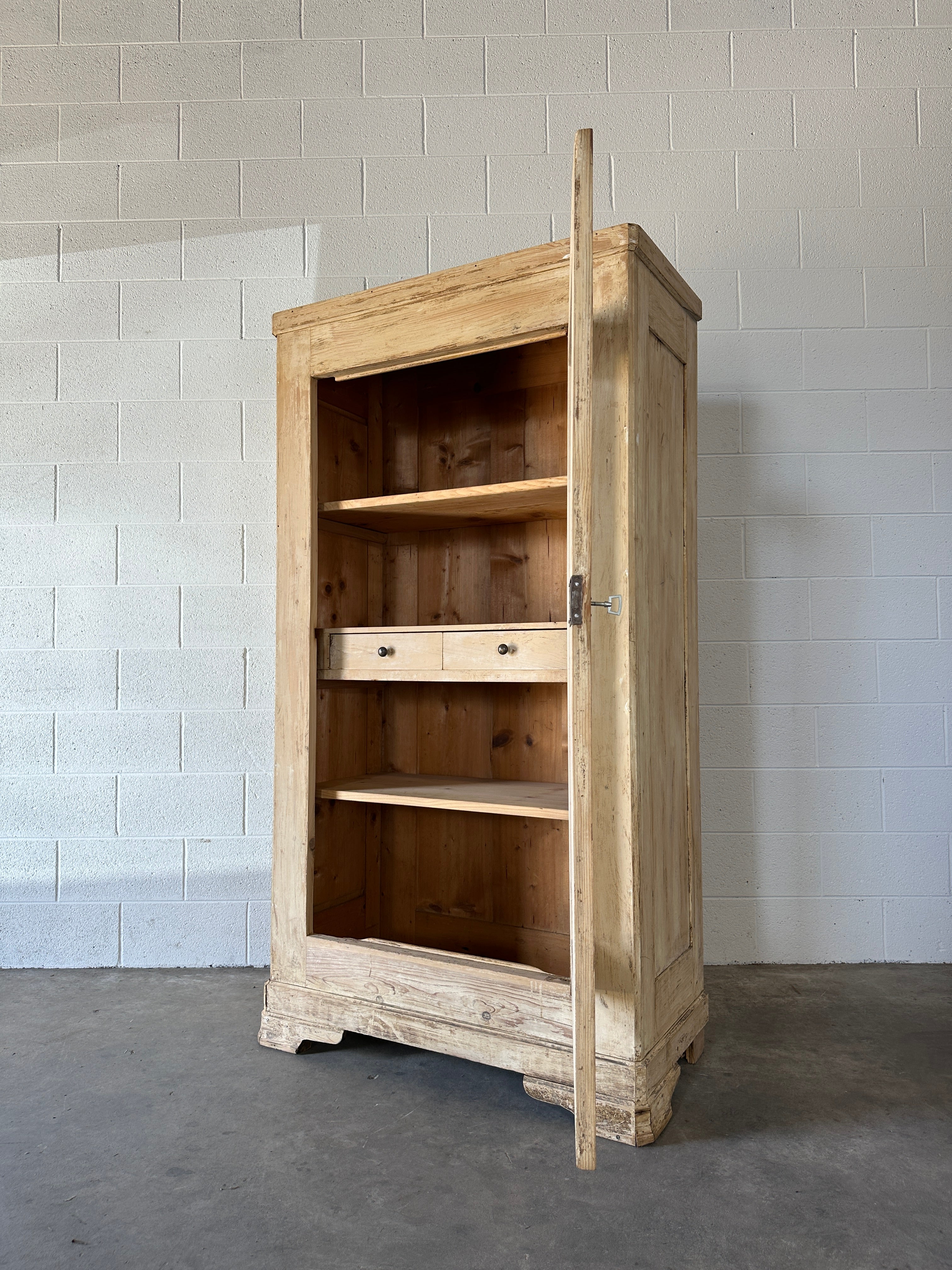 Antique French cupboard with glass door