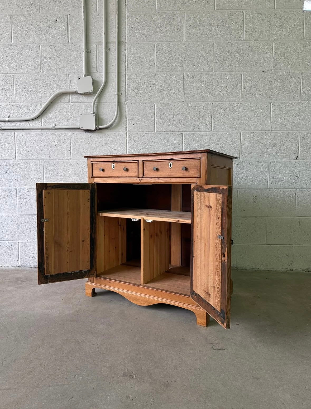 Vintage European pine cupboard