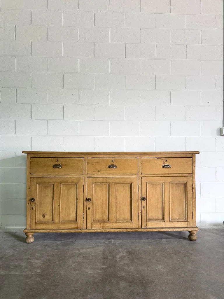 Tall antique English pine sideboard with drawers