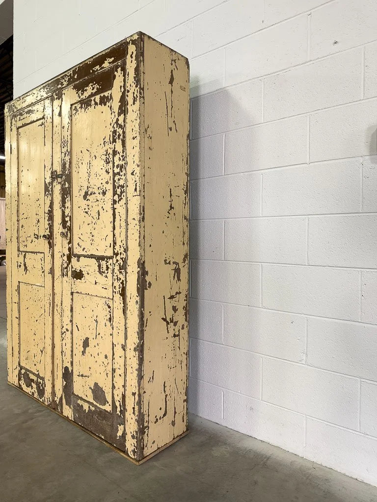 Primitive cupboard in chippy paint