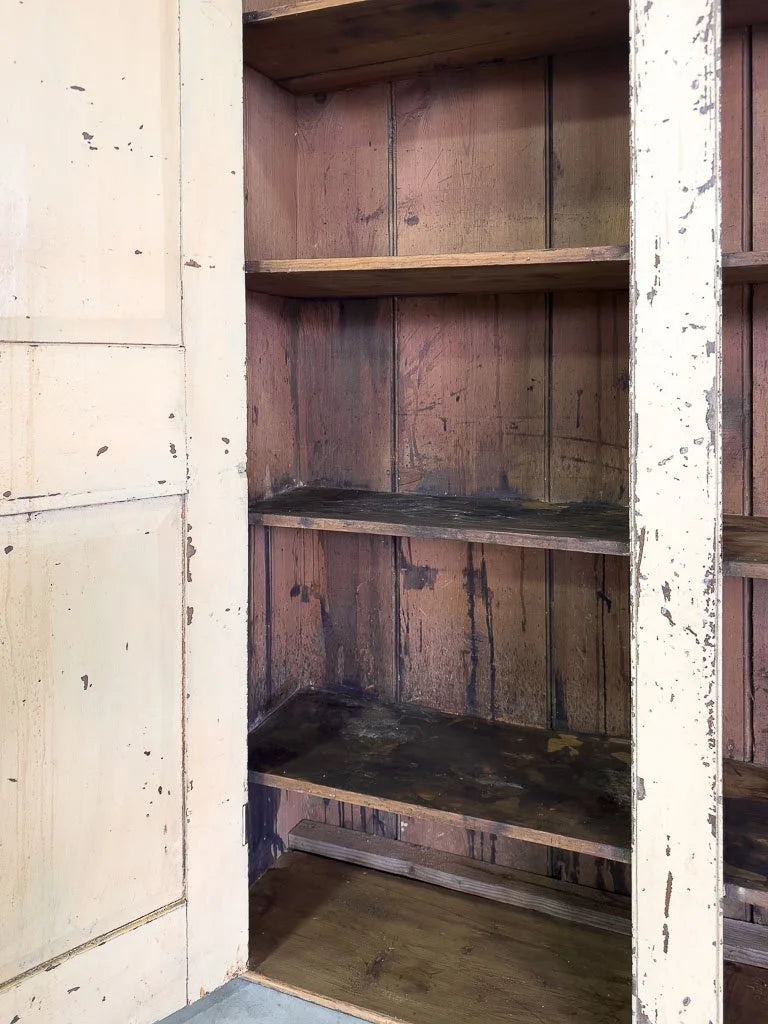 Primitive cupboard in chippy paint