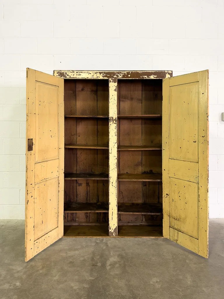 Primitive cupboard in chippy paint