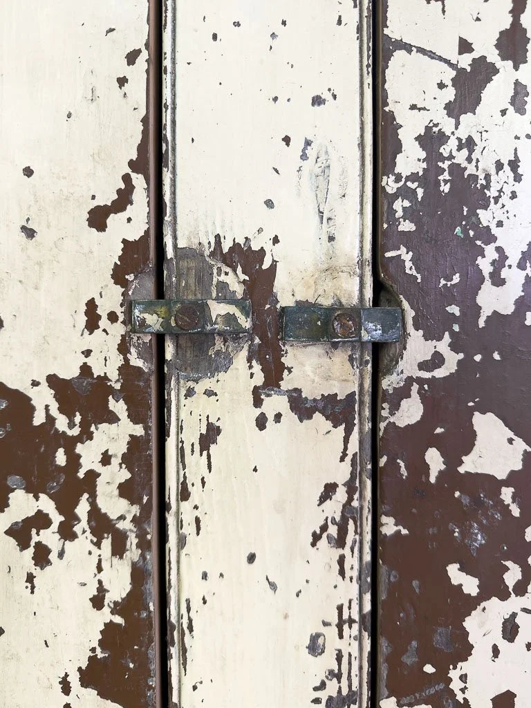 Primitive cupboard in chippy paint