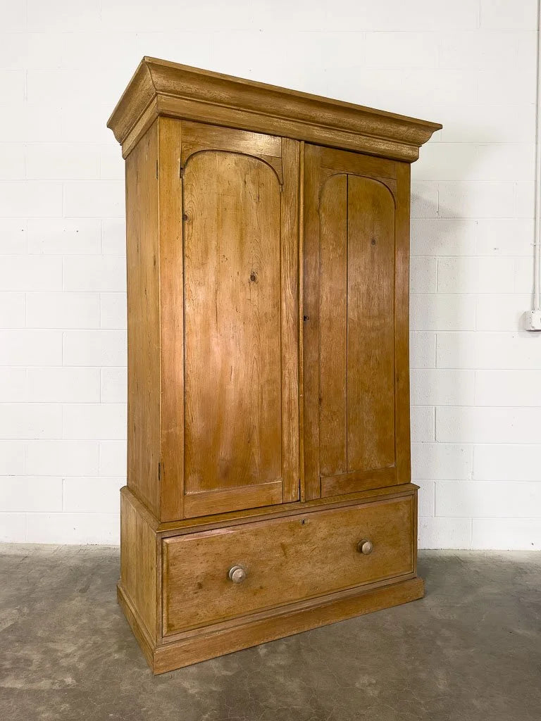 Antique English pine wardrobe or cupboard with a drawer