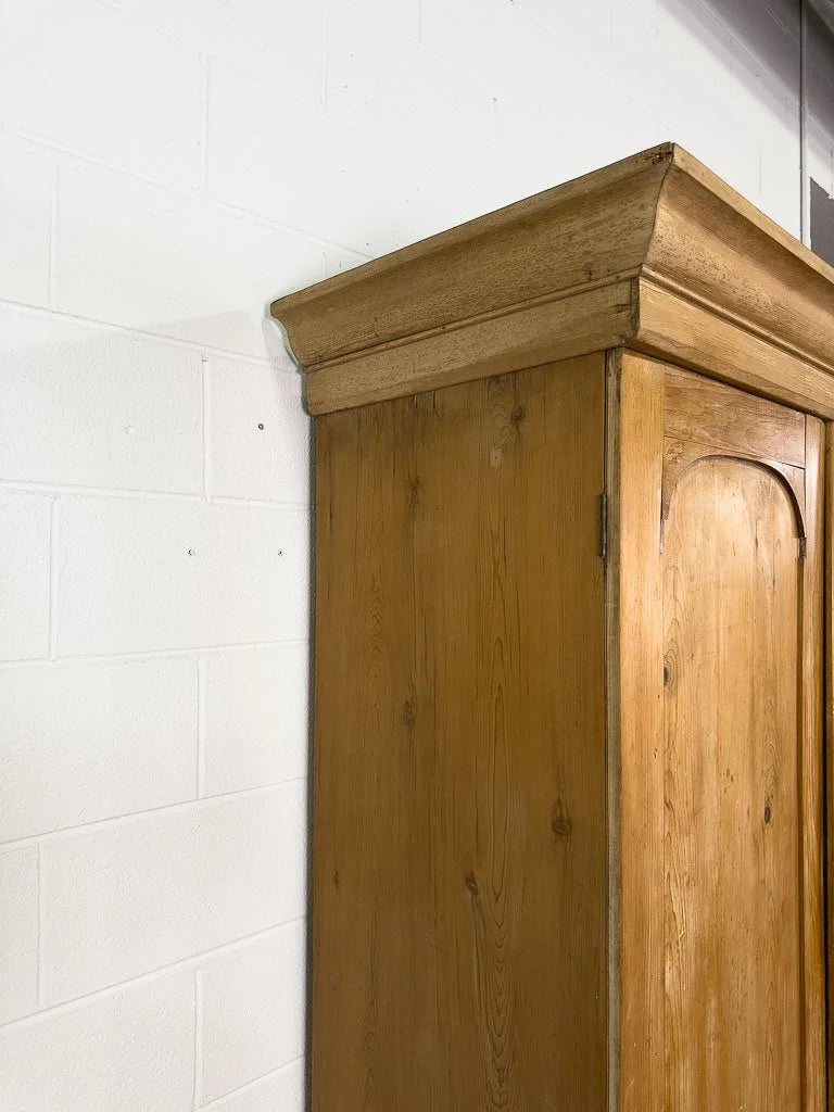 Antique English pine wardrobe or cupboard with a drawer