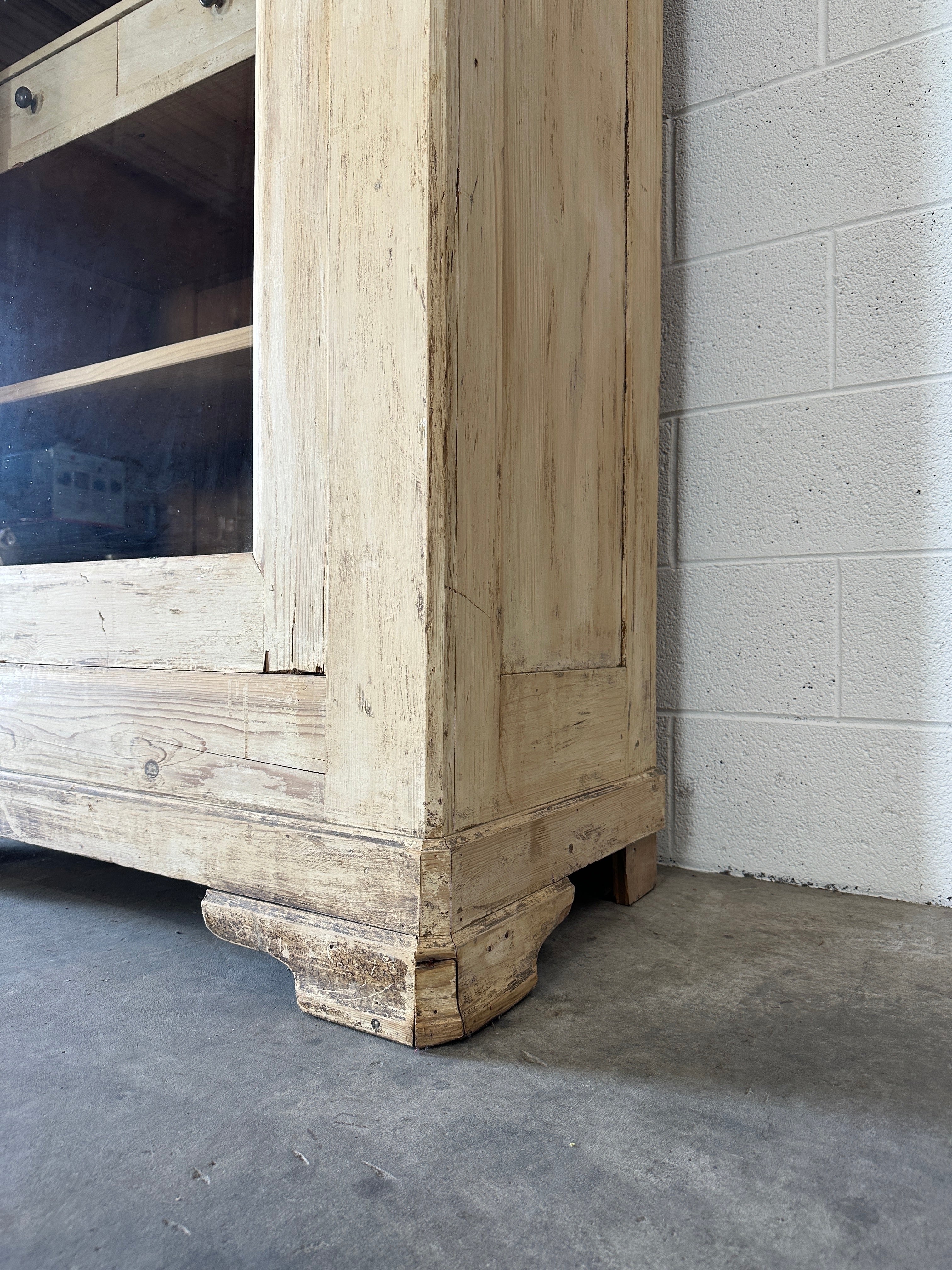 Antique French cupboard with glass door