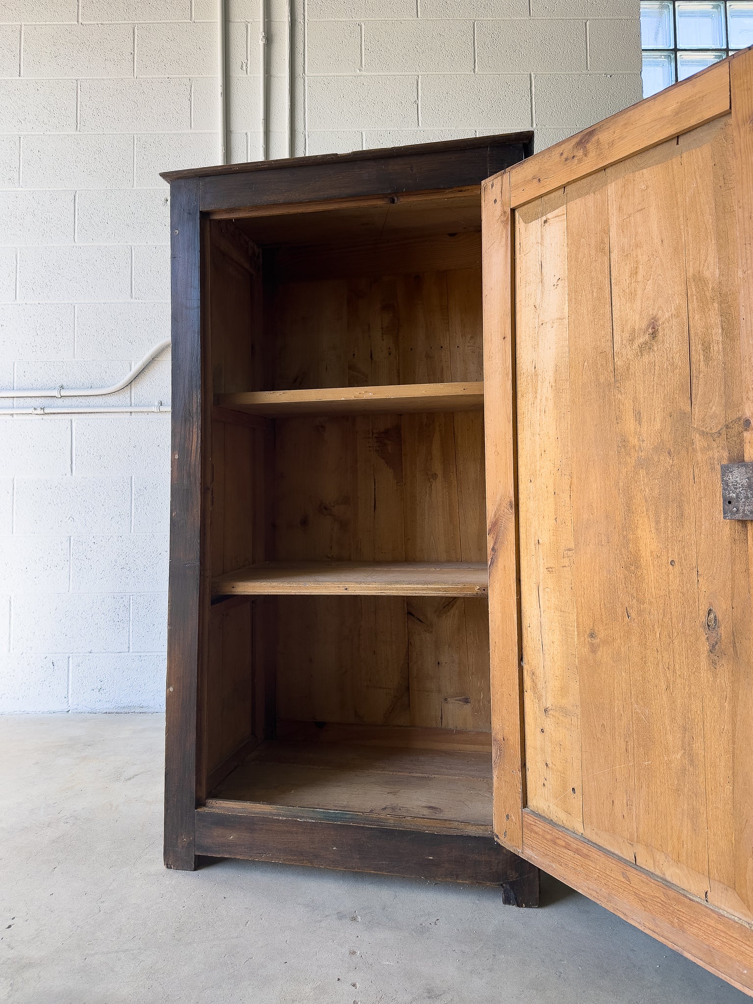 Dark stained antique pine cupboard