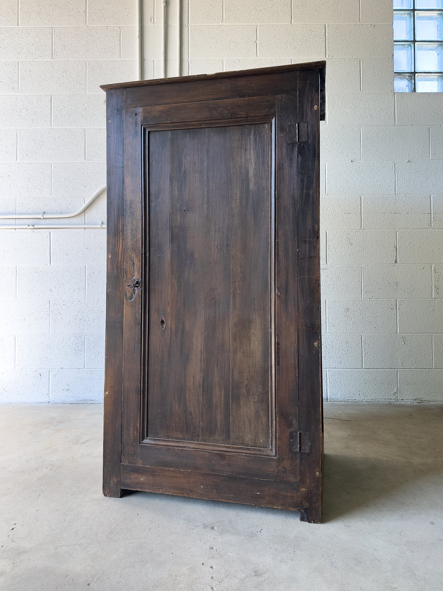 Dark stained antique pine cupboard