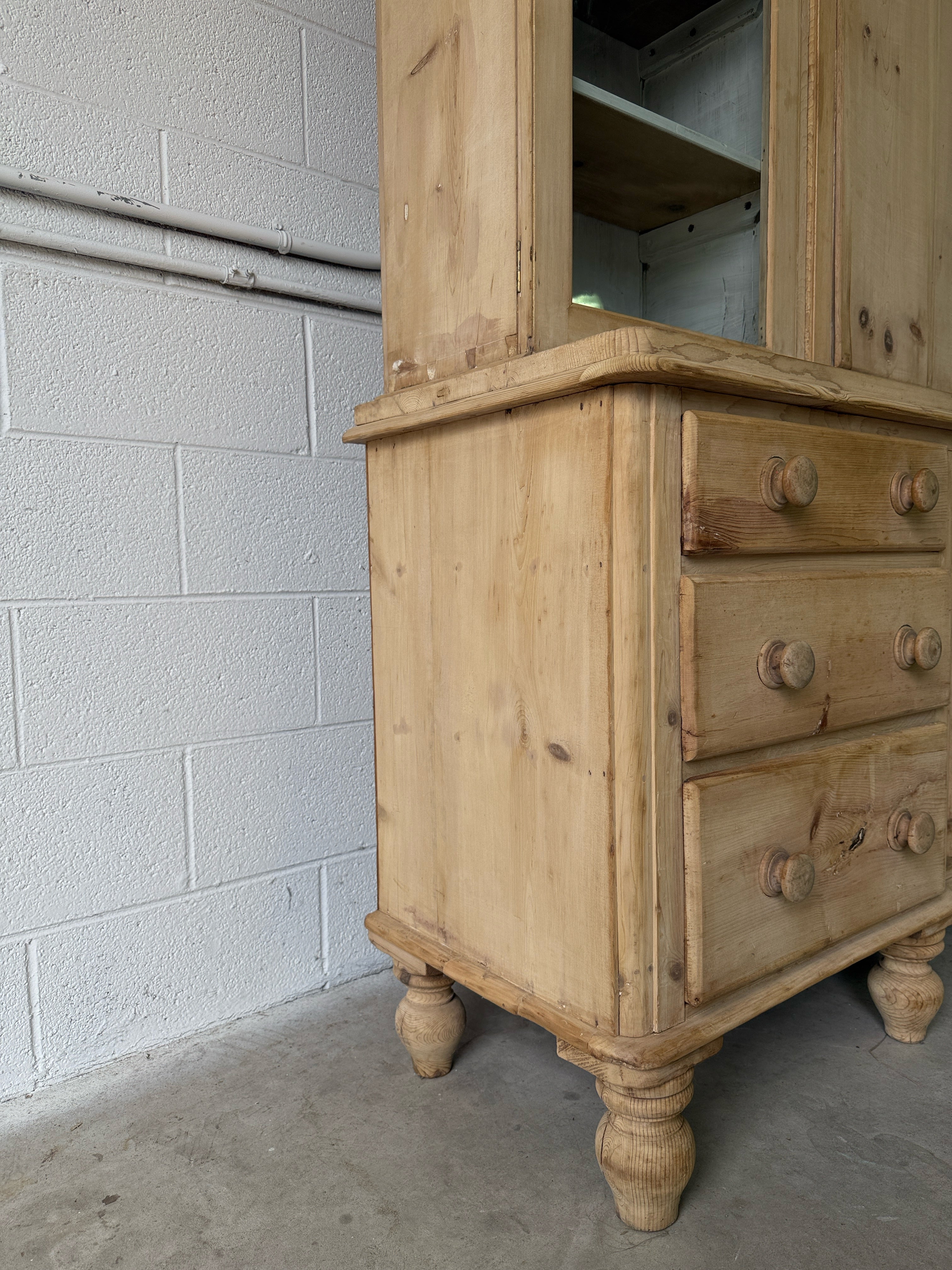 Antique pine housekeepers cupboard with wavy glass