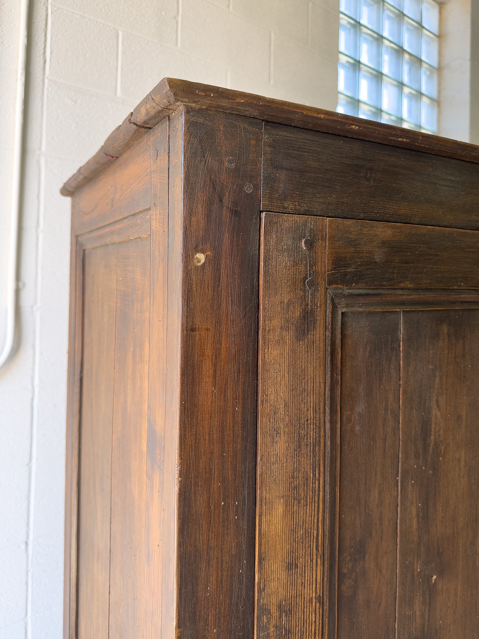 Dark stained antique pine cupboard