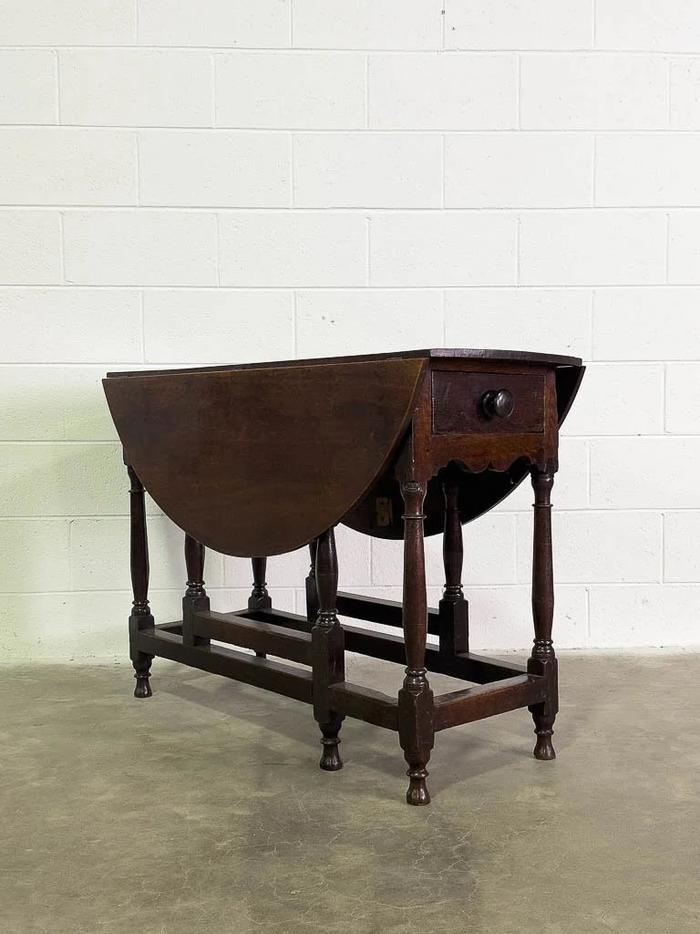 Antique oak gate leg table with drawer