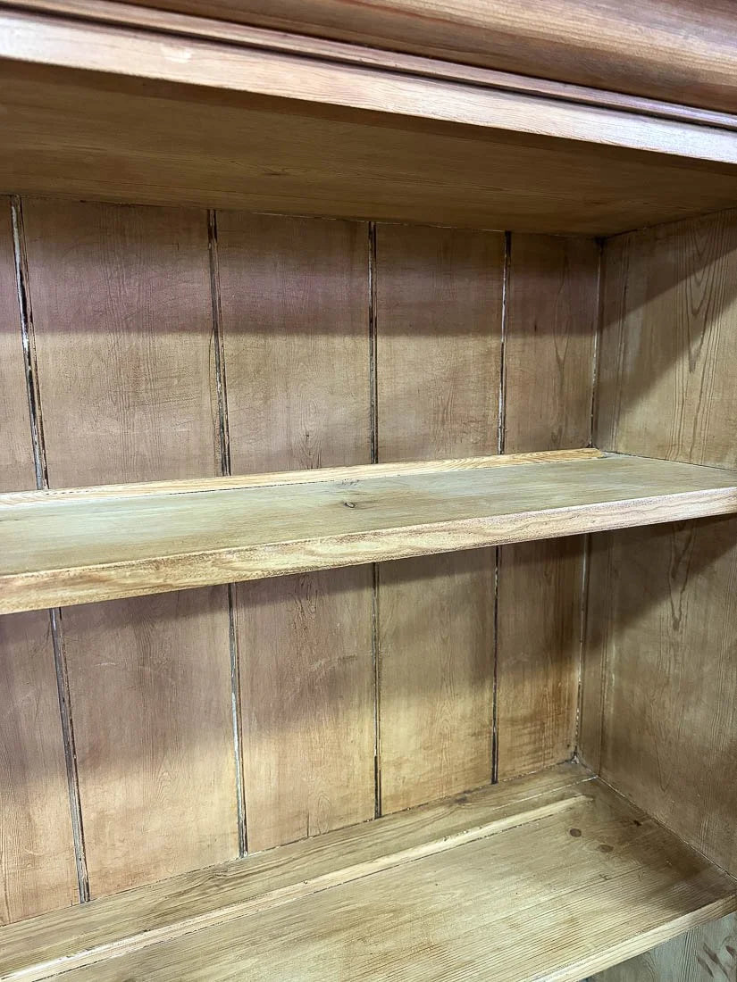 Antique English pine hutch with wavy glass