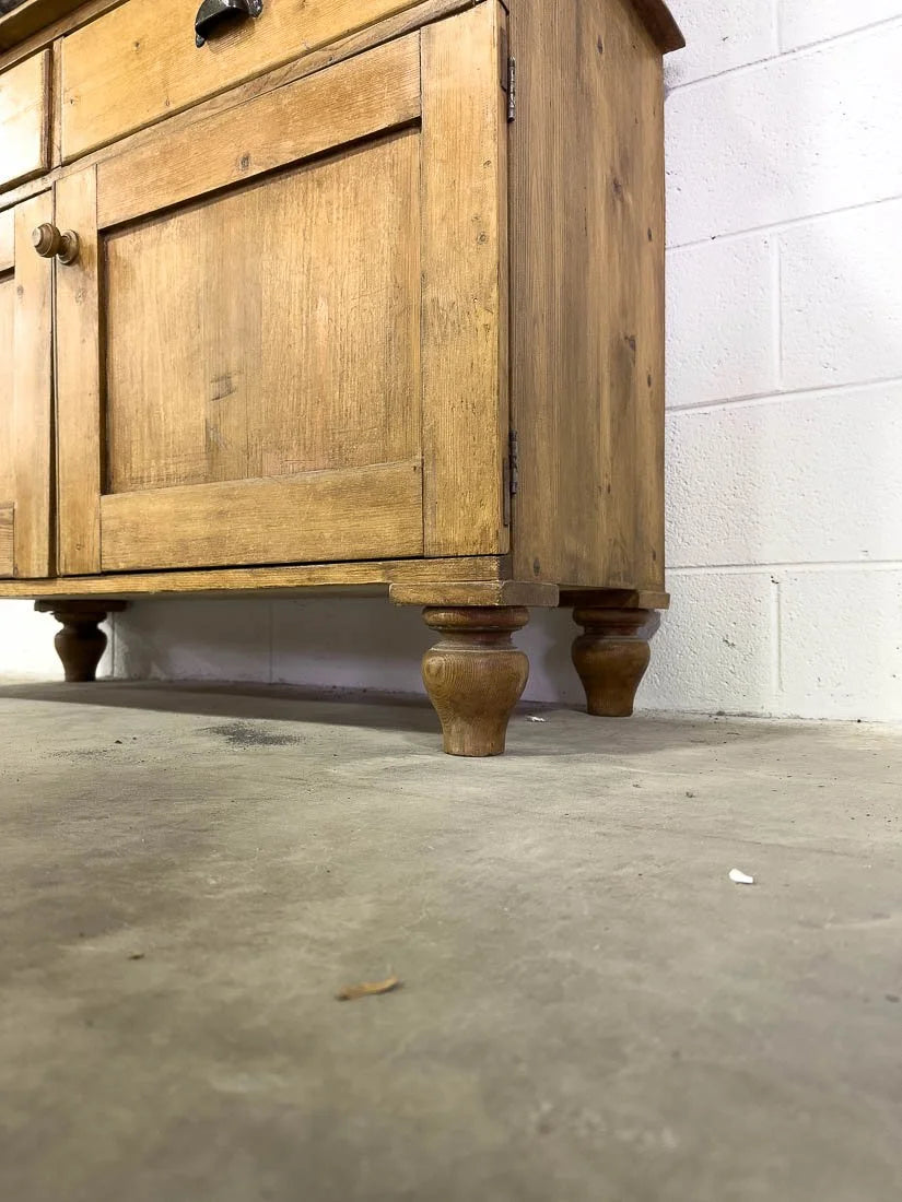 Antique English pine hutch with wavy glass