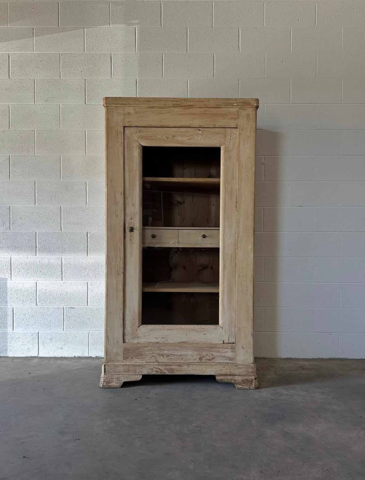 Antique French cupboard with glass door