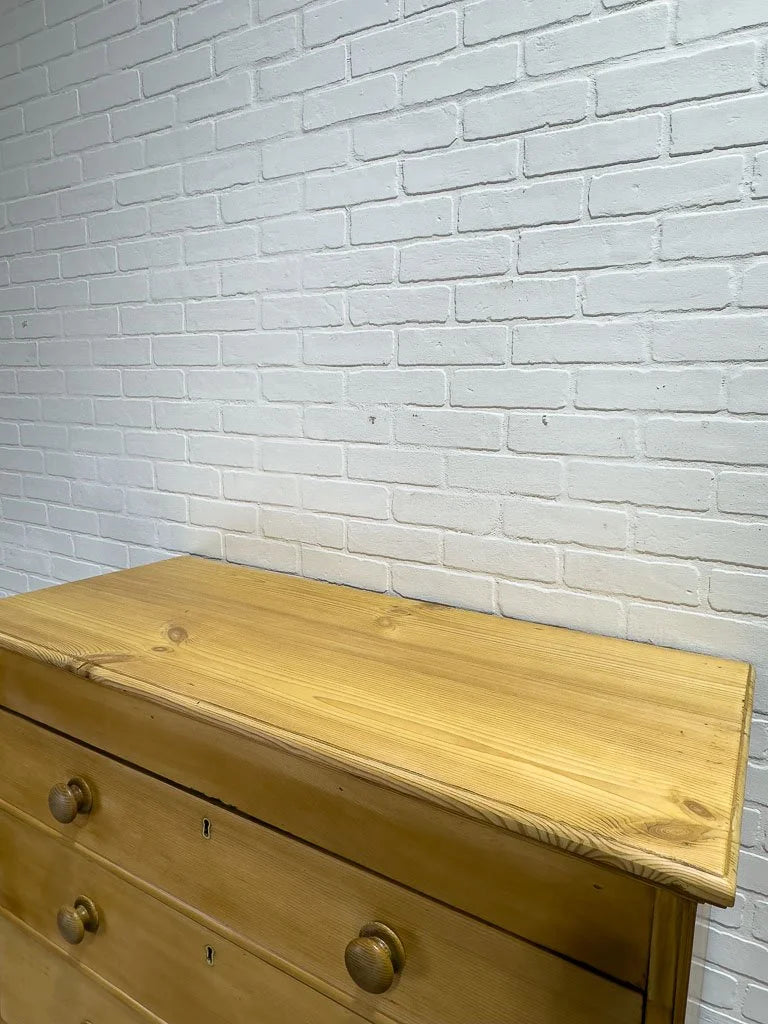 Tall antique pine chest of drawers