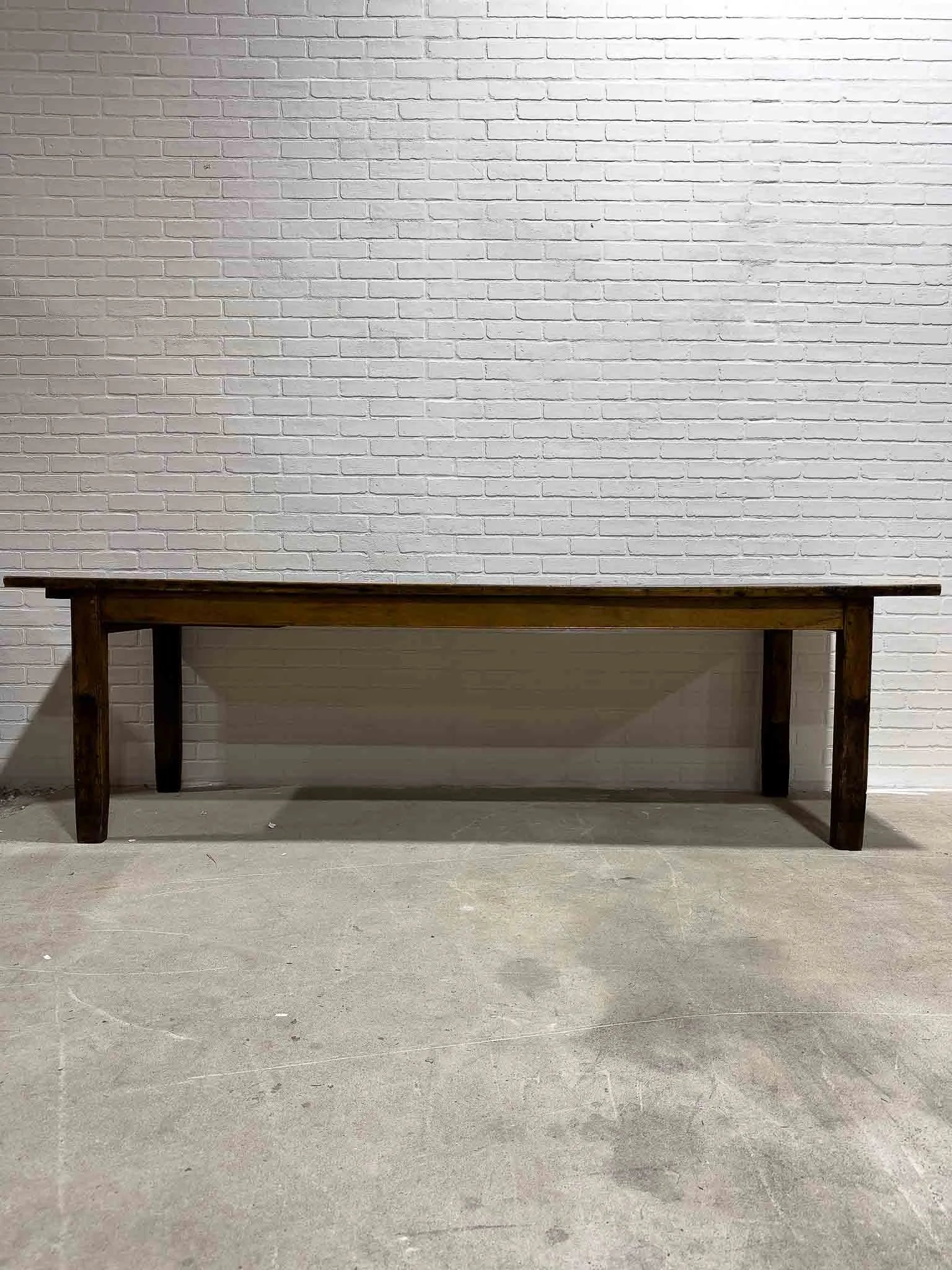 Wonderful eight foot French table with a drawer