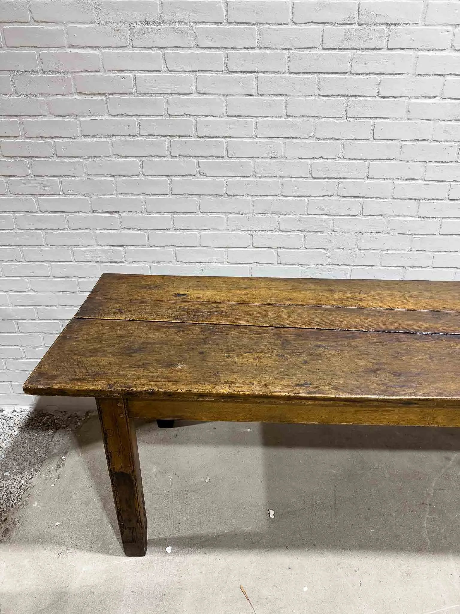 Wonderful eight foot French table with a drawer