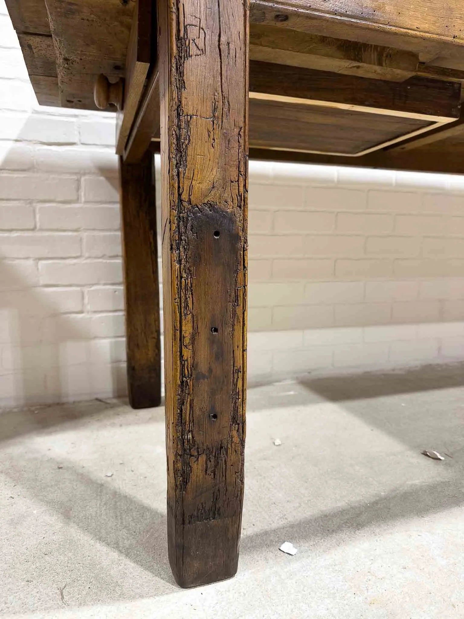Wonderful eight foot French table with a drawer
