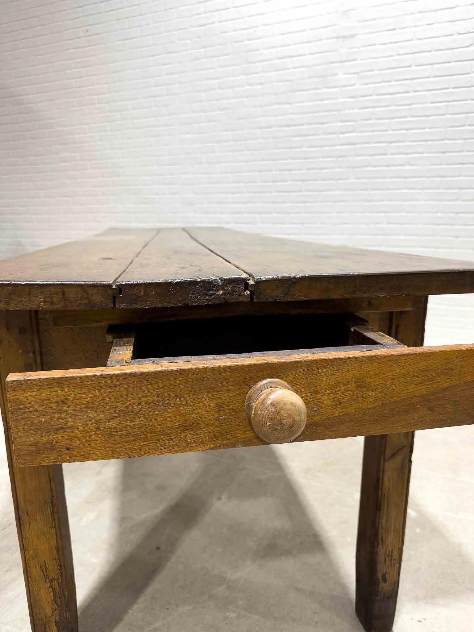 Wonderful eight foot French table with a drawer