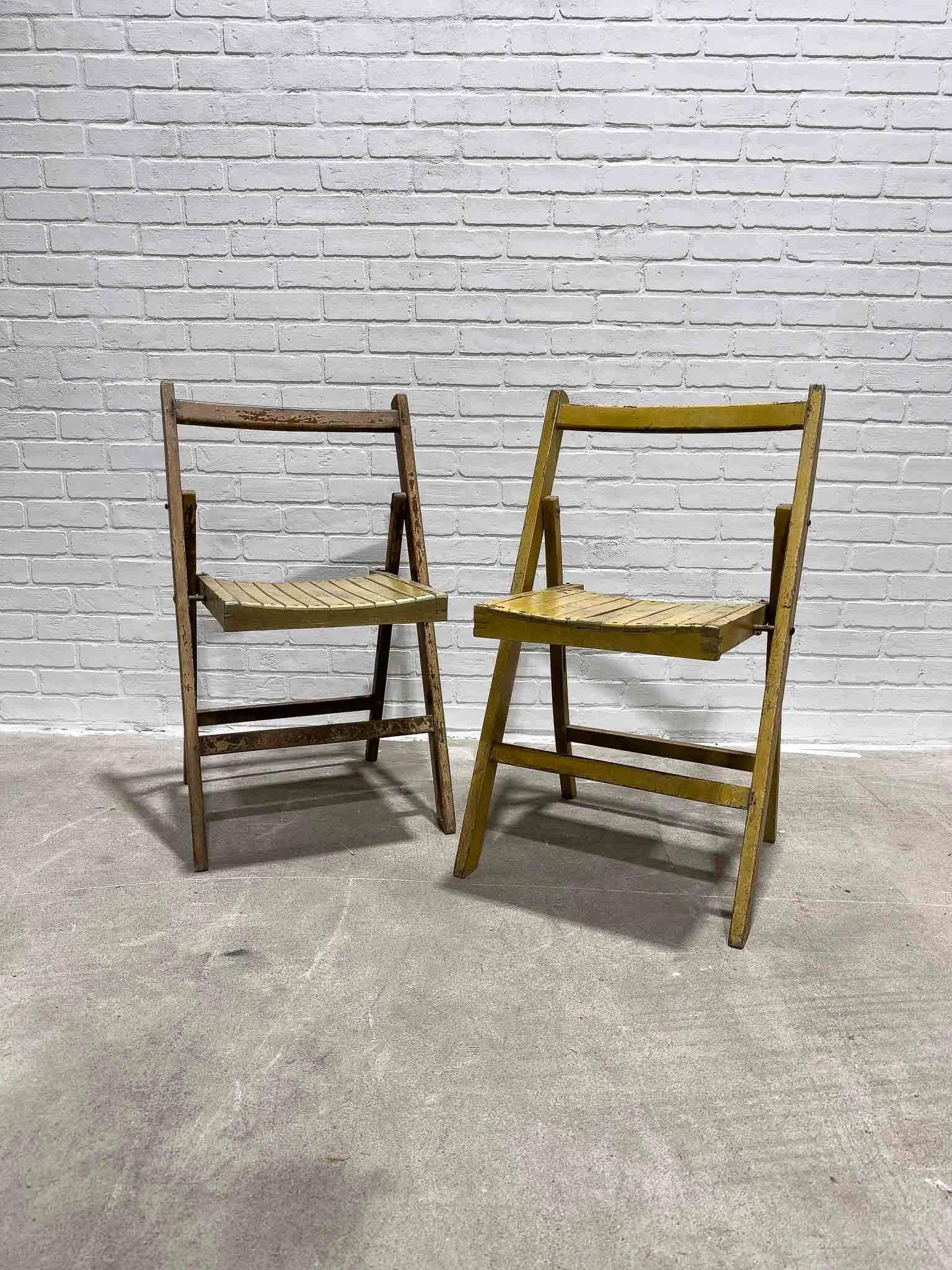 Pair of vintage yellow folding chairs