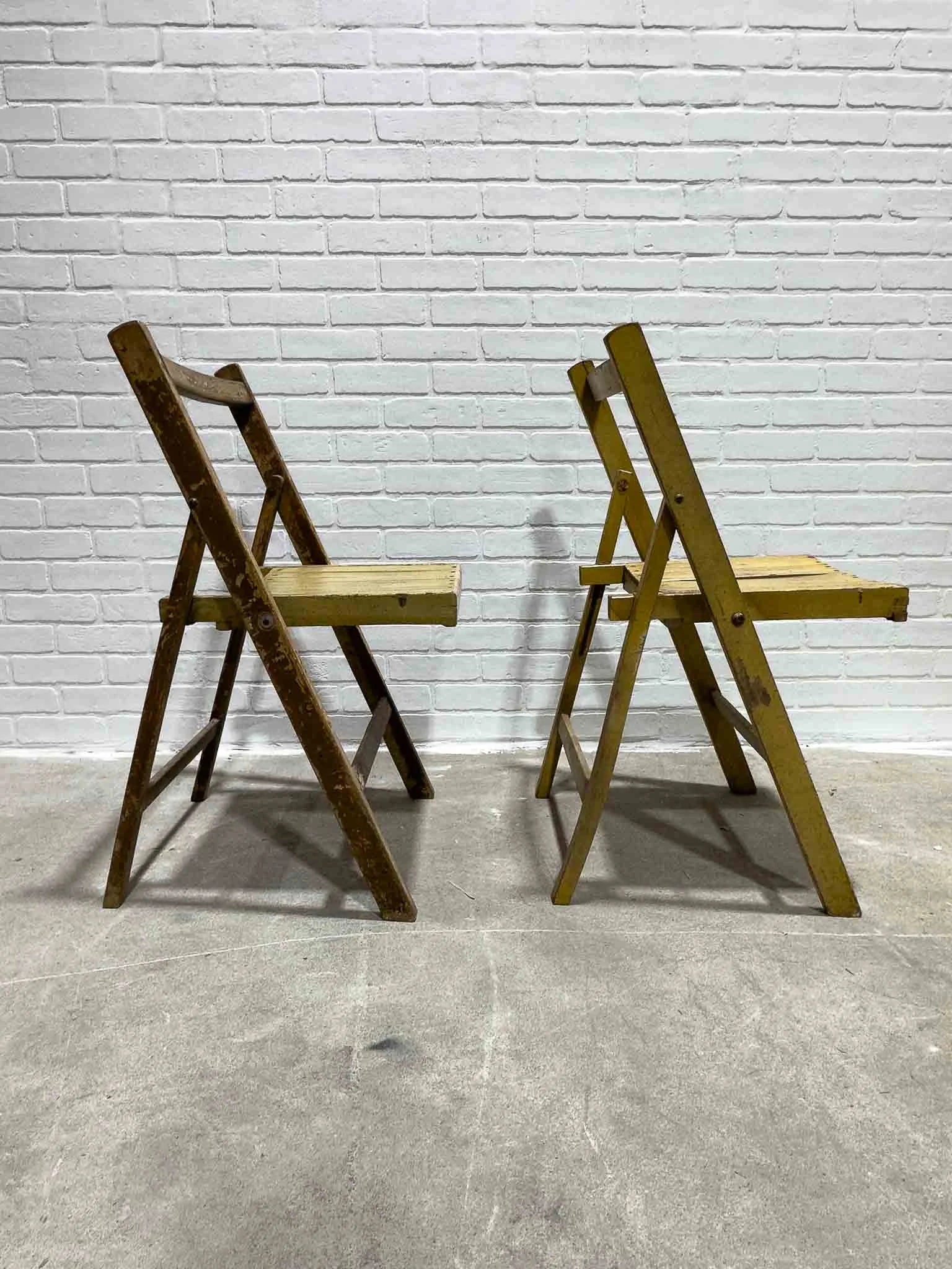 Pair of vintage yellow folding chairs