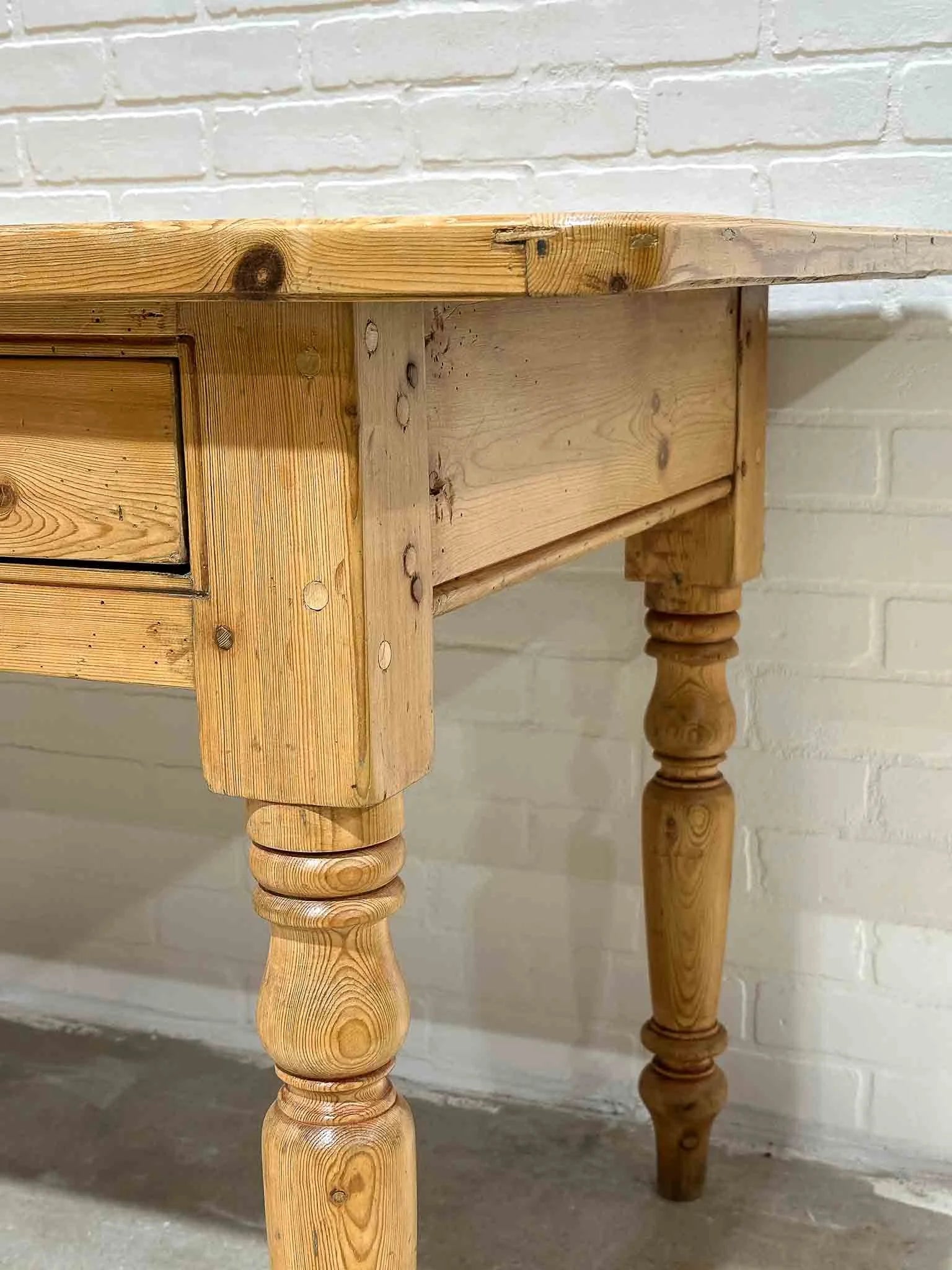 Antique English dining table with two drawers