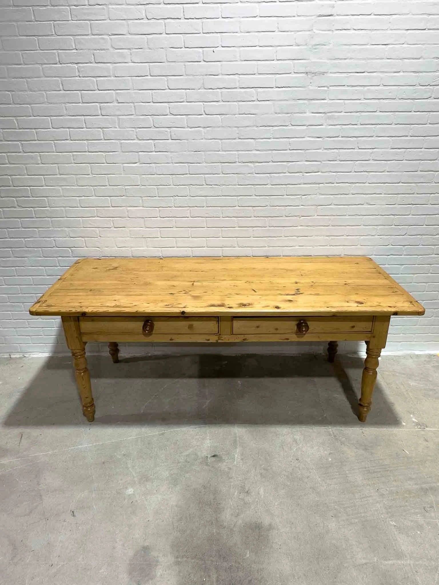 Antique English dining table with two drawers