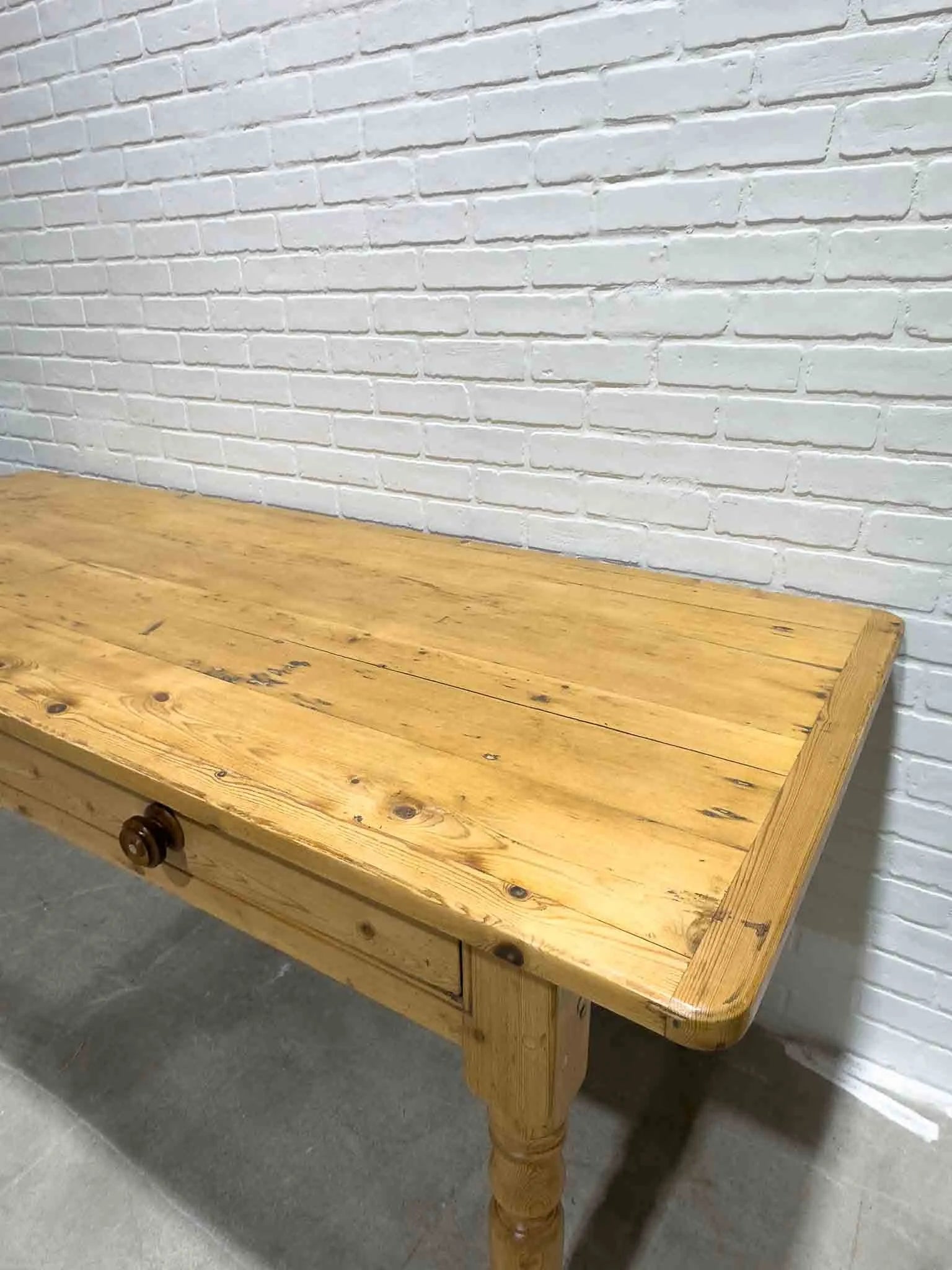 Antique English dining table with two drawers