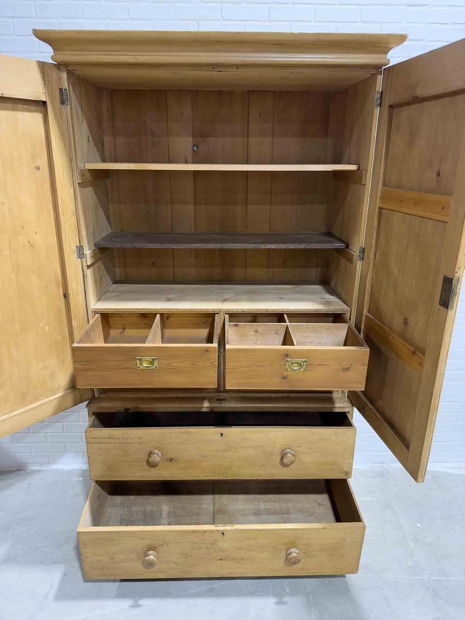 Antique English linen press with interior drawers
