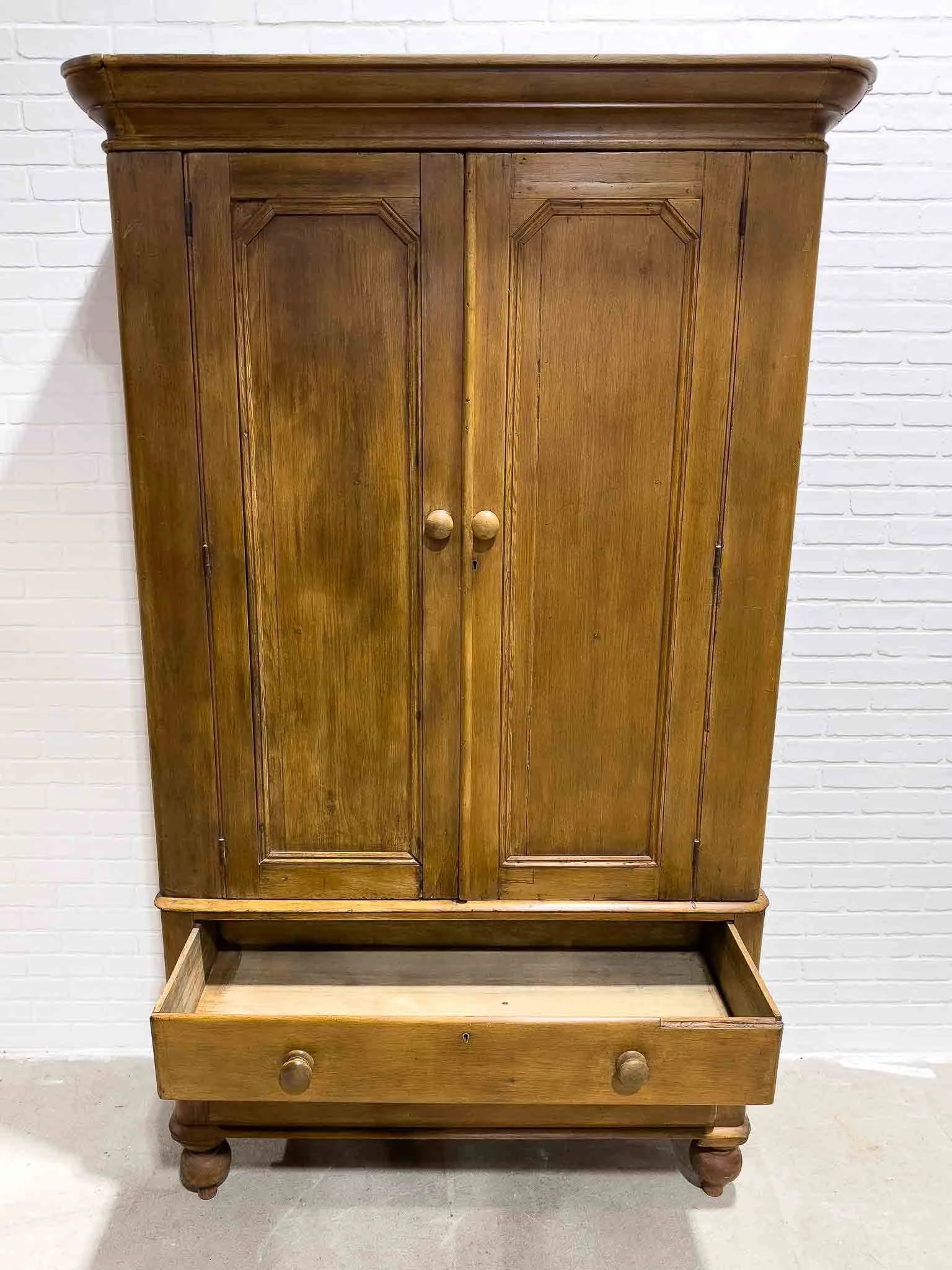 Antique pine wardrobe on tulip feet