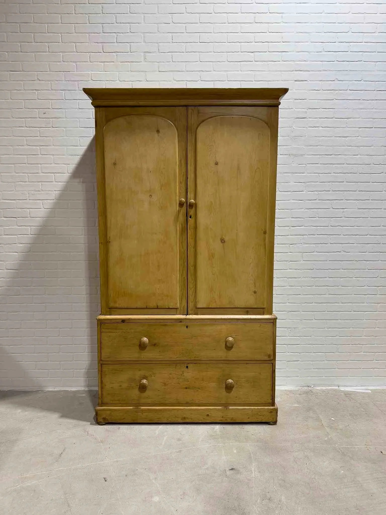 Antique English linen press with interior drawers