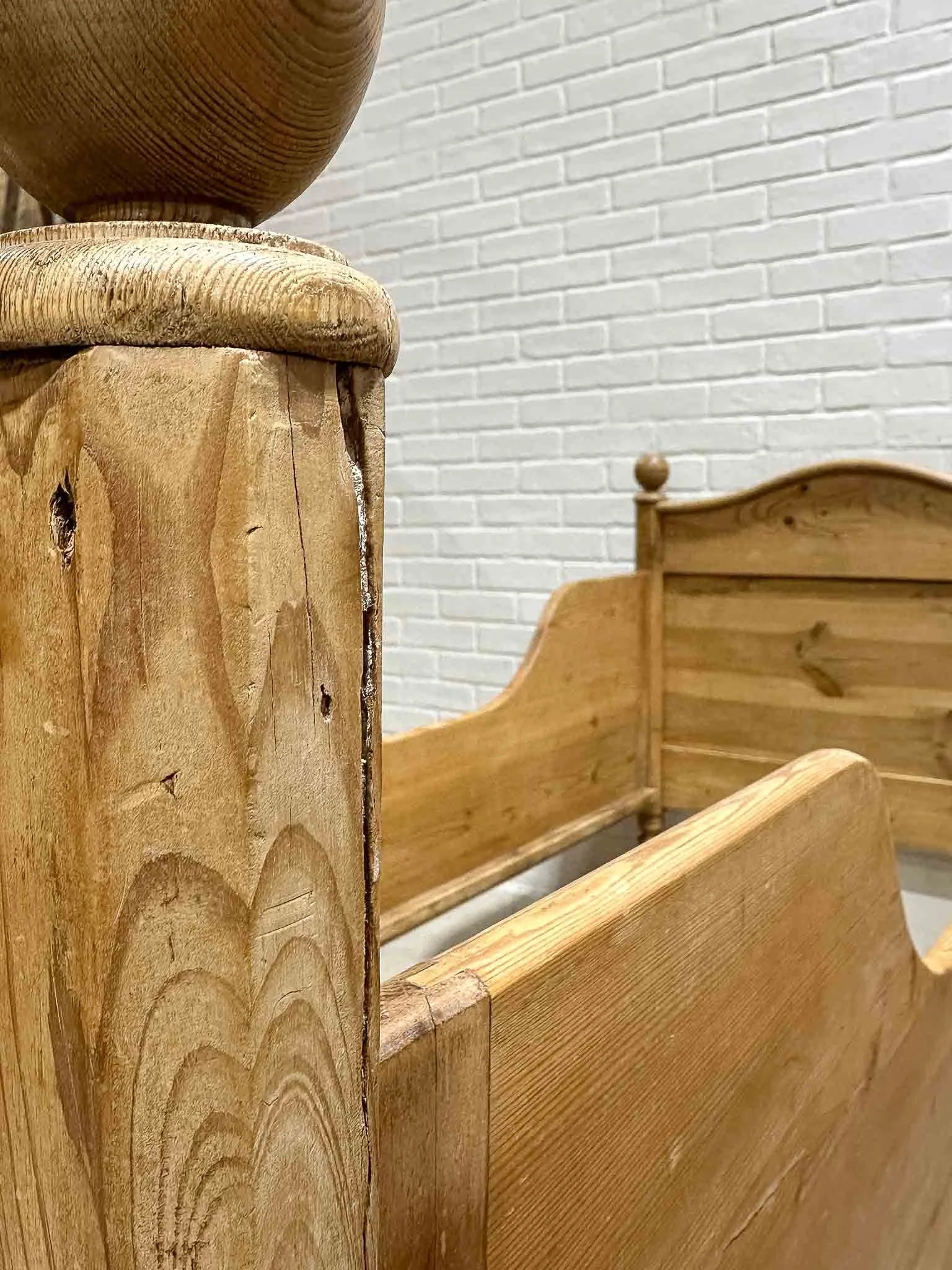 Narrow English pine sleigh bed