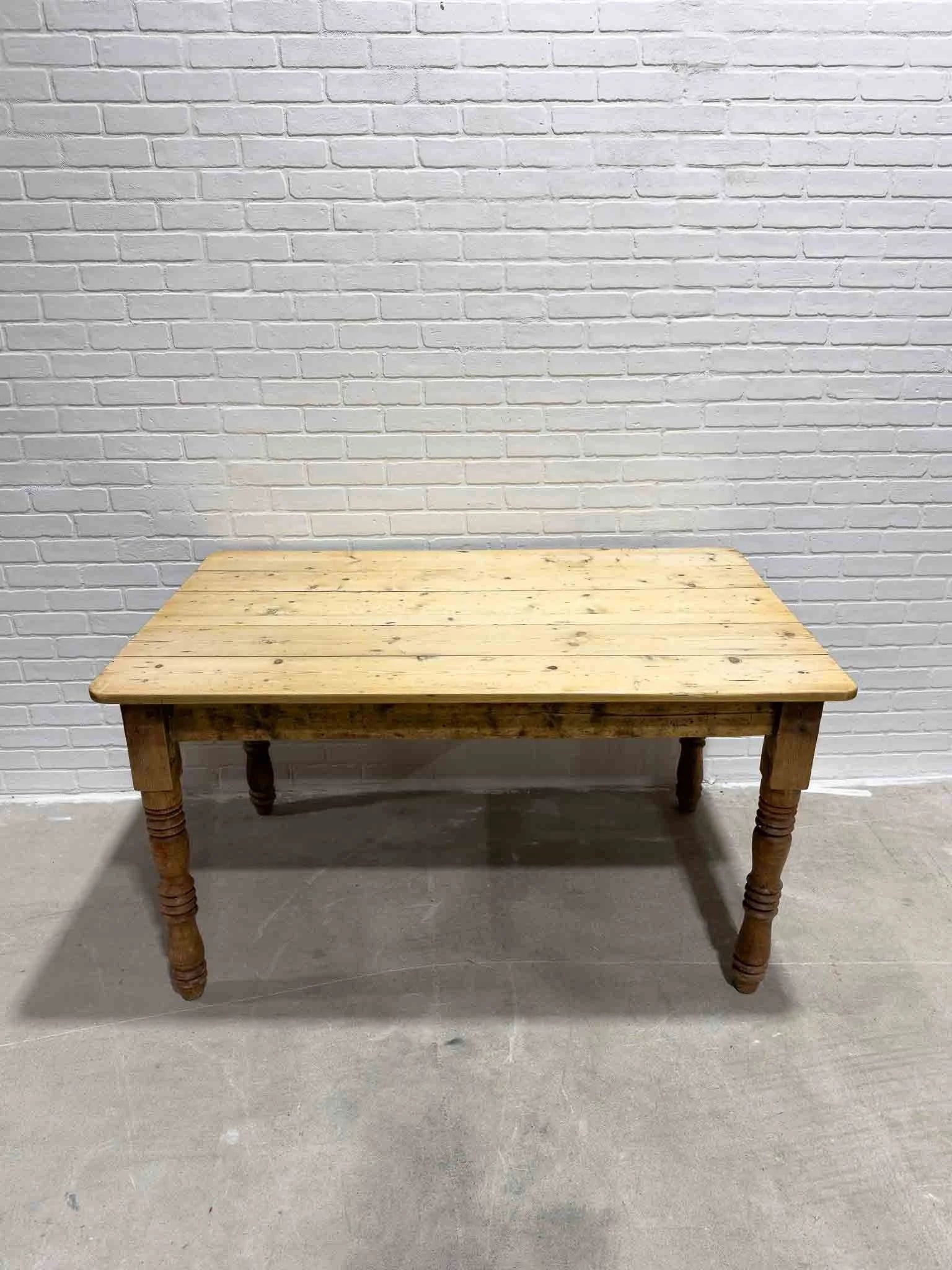 Antique pine kitchen table with a plank top