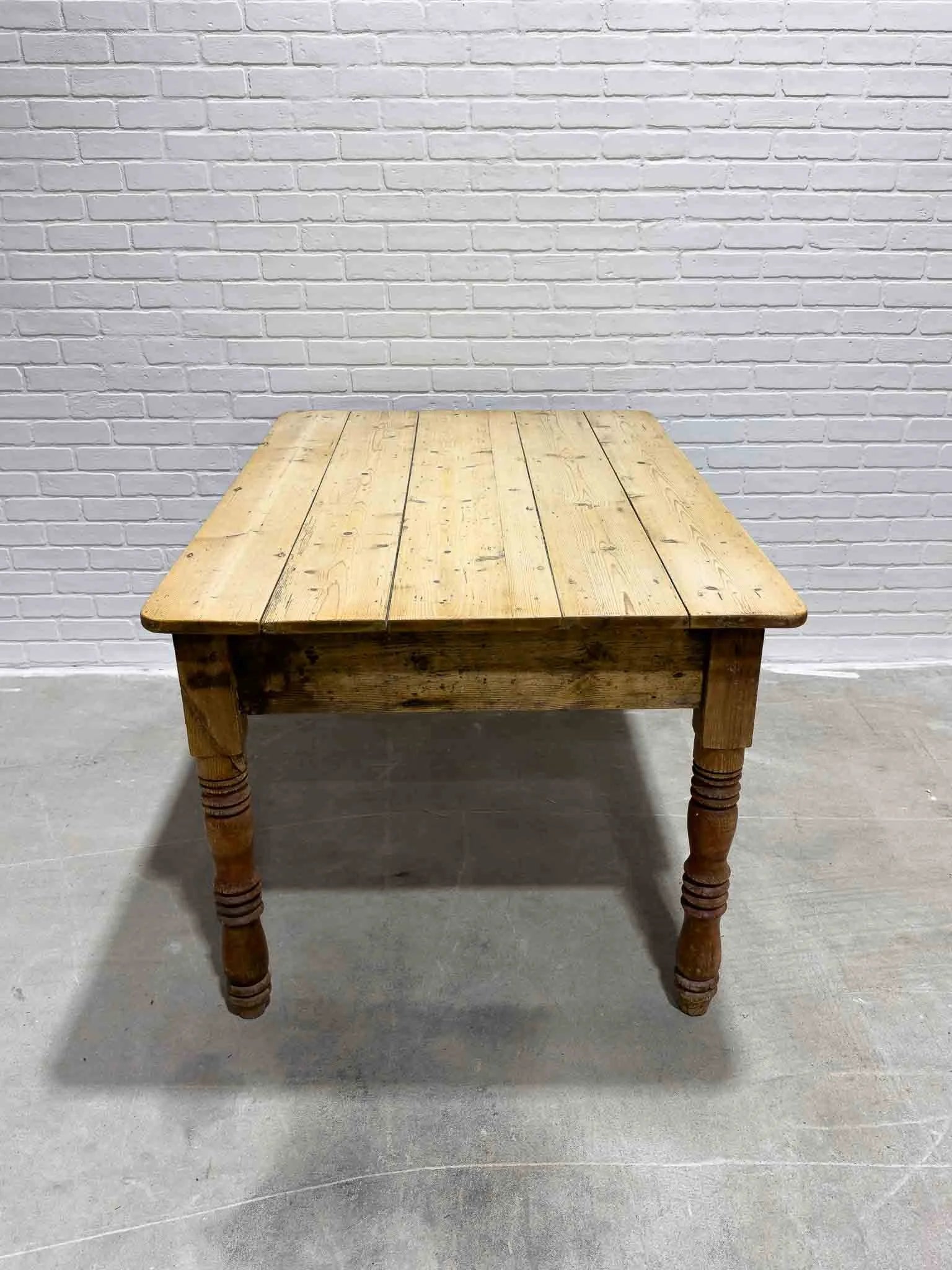 Antique pine kitchen table with a plank top