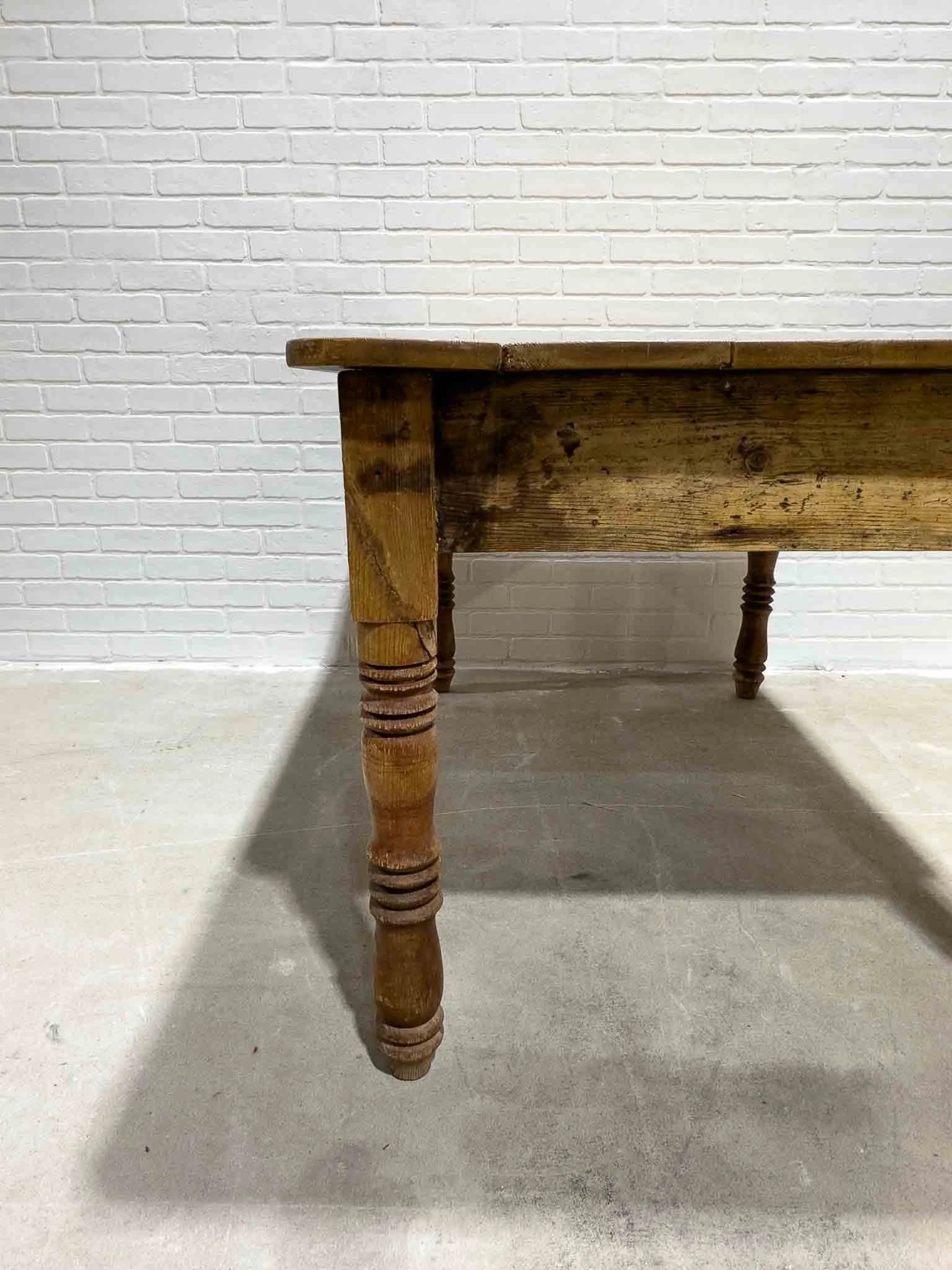 Antique pine kitchen table with a plank top
