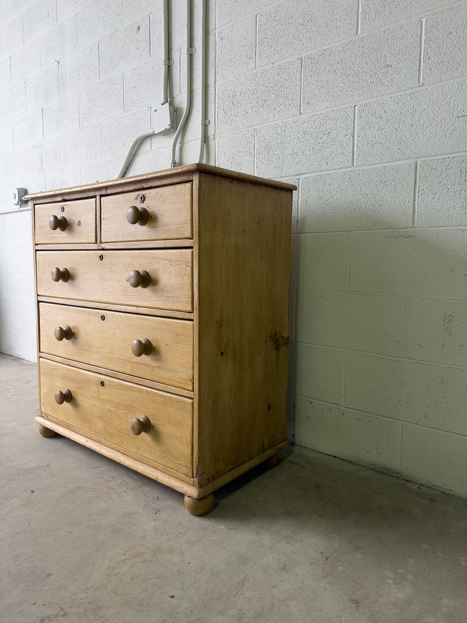 Light colored English antique pine drawers