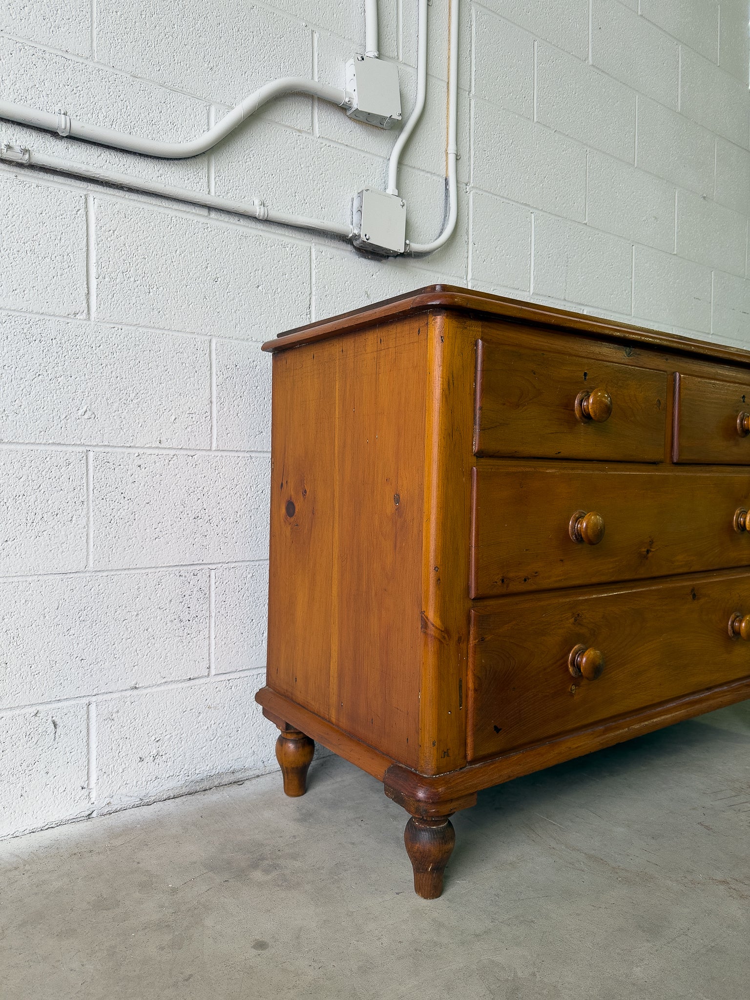 Antique pine chest of drawers on turned feet