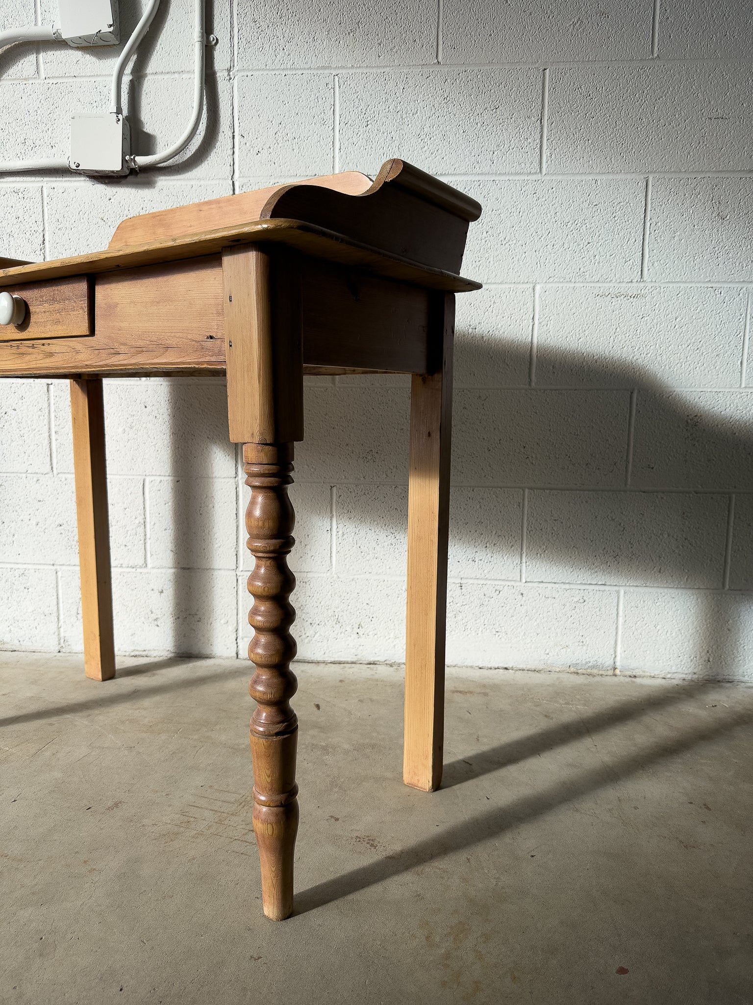 Antique pine washstand with turned legs