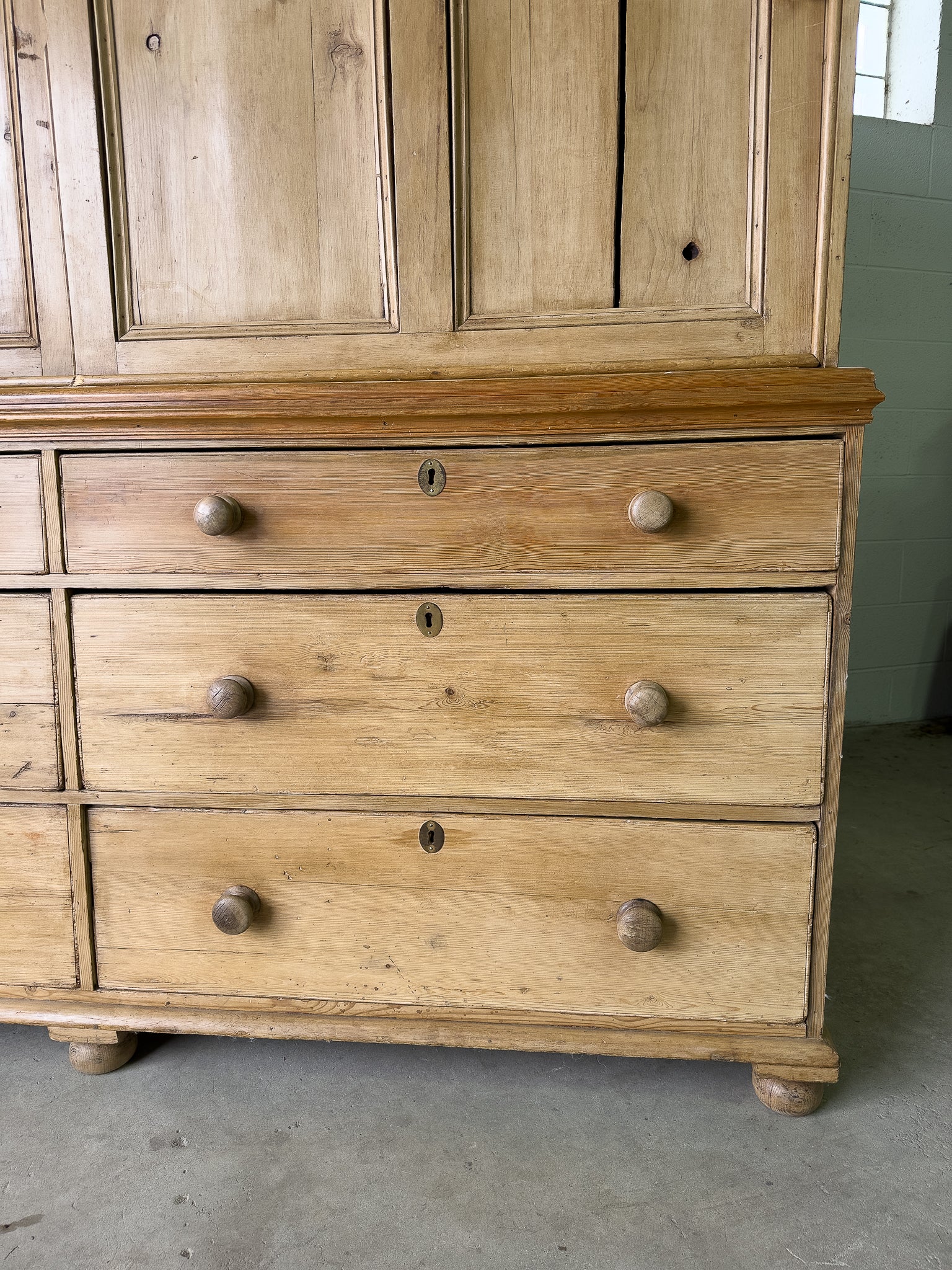 Large antique pine housekeepers cupboard with sliding doors