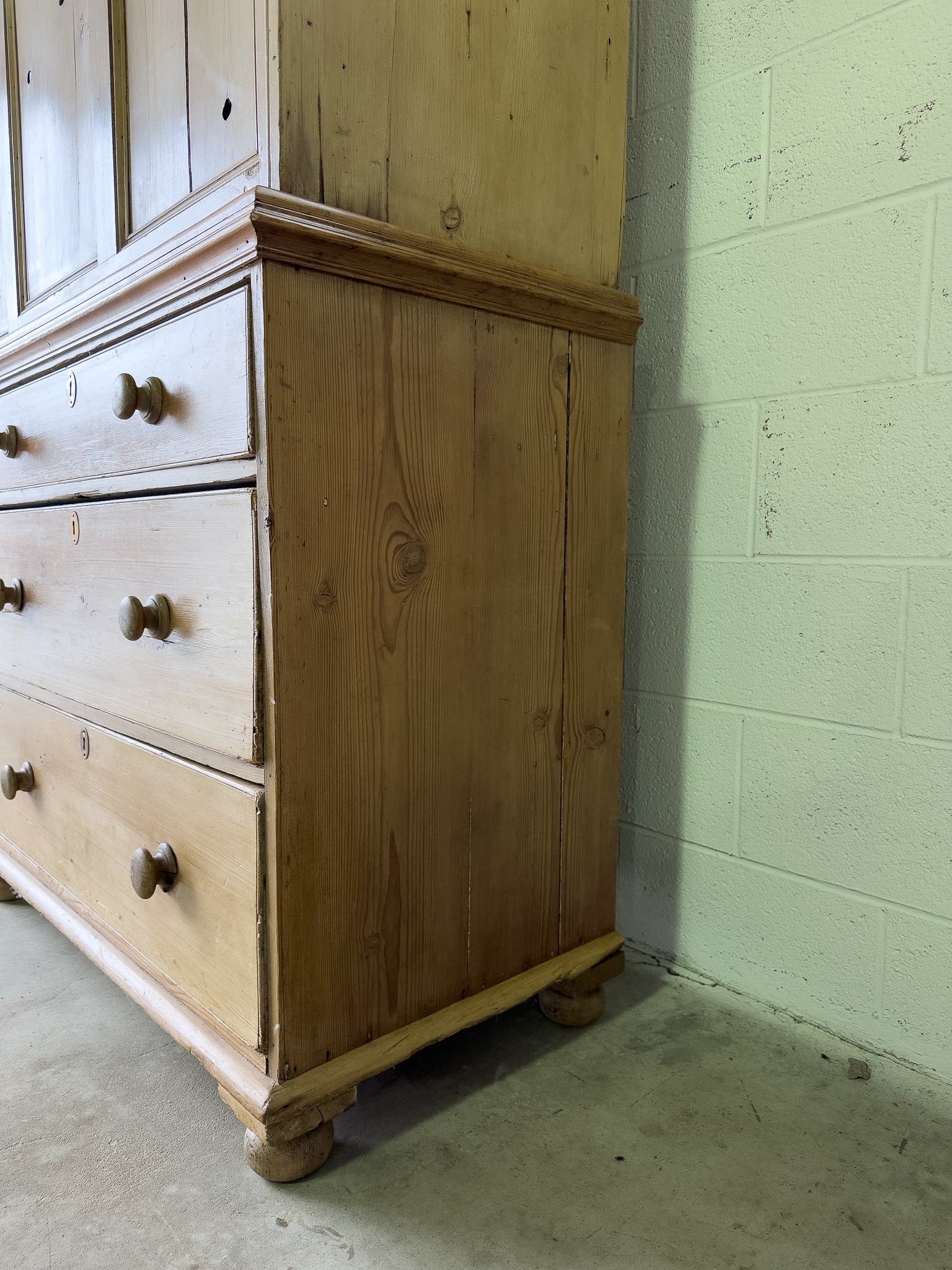 Large antique pine housekeepers cupboard with sliding doors